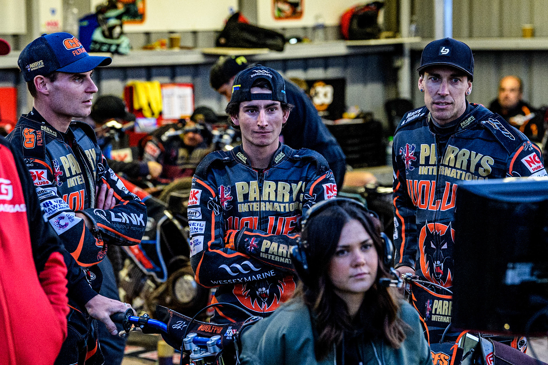 (l - r) Steve Worrall, Zach Cook and Sam Masters watch the TV Monitor to see the playback during the Sports Insure Premiership match between Wolverhampton Wolves and Belle Vue Aces at Monmore Green Stadium, Wolverhampton on Monday 29th May 2023. (Photo: Ian Charles | MI News)