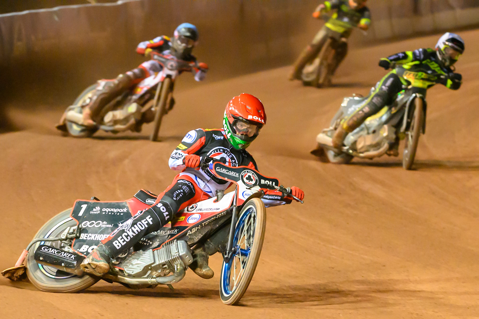 Brady Kurtz of Belle Vue Aces in Red leading Tobias Musielak of Ipswich Witches in White  and Norick Blödorn of Belle Vue Aces in Blue during the Rowe Motor Oil Premiership Play Off Semi Final 2nd leg match between Belle Vue Aces and Ipswich Witches at the National Speedway Stadium, Manchester on Monday 28th September 2026. (Photo: Ian Charles | MI News)