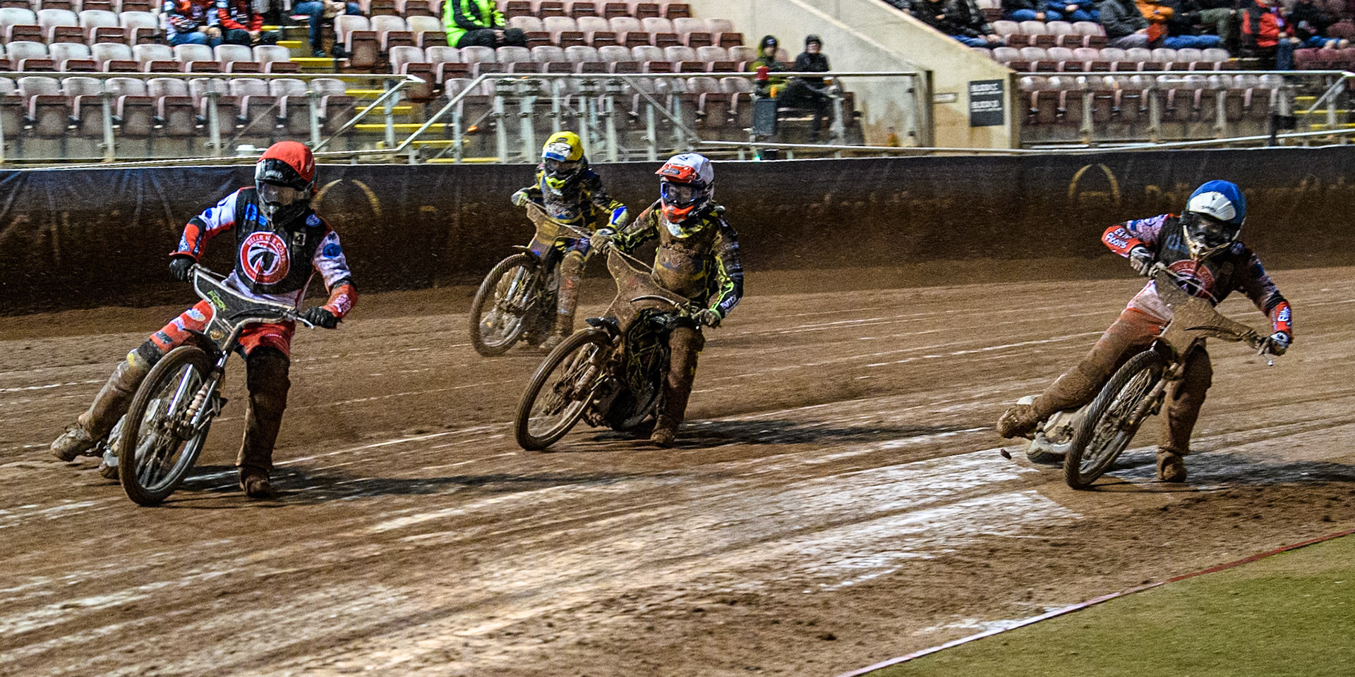Belle Vue Colts' Matt Marson in Red leading Belle Vue Colts' Chad Wirtzfeld in Blue, Sheffield Cubs' Ace Pijper in White and sc7\ in Yellow during the WSRA National Development League match between Belle Vue Colts and Sheffield Tiger Cubs at the National Speedway Stadium, Manchester on Monday 7th October 2024. (Photo: Ian Charles | MI News)