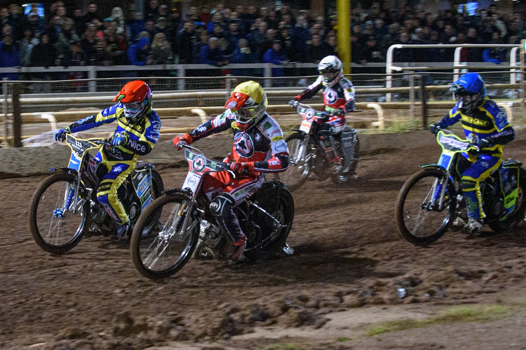 SHEFFIELD, UK. OCT 4THRichie Worrall  (Yellow) inside Jack Holder  (Red) with Troy Batchelor  (Blue) and Dan Bewley  (White) behind during the SGB Premiership Semi Final Playoff 1st Leg between Sheffield Tigers and Belle Vue Aces at Owlerton Stadium, Sheffield on Monday 4th October 2021. (Credit: Ian Charles | MI News)