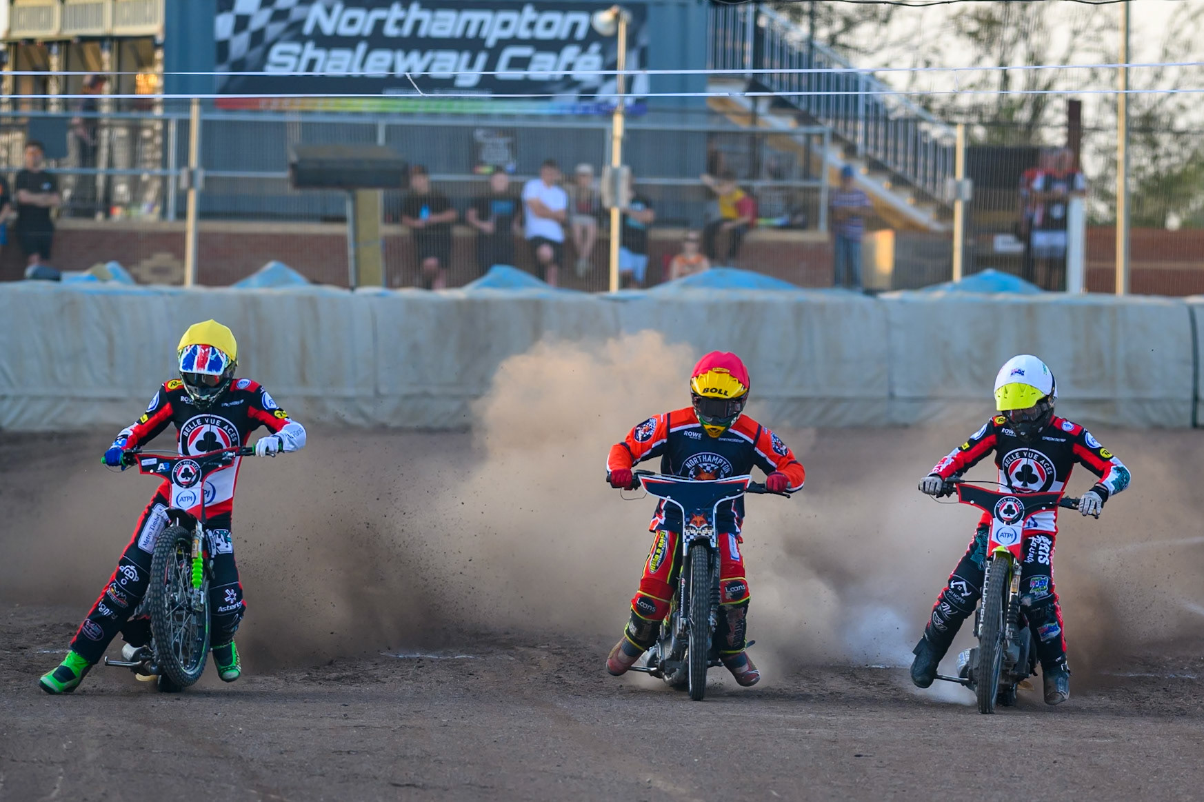 (L to R) Will Cairns of Belle Vue Aces in Yellow , Mitch McDiarmid of Northampton Foxes in Red  and Tate Zischke of Belle Vue Aces  in White  leave the start line during the Rowe Motor Oil Premiership match between Northampton Foxes and Belle Vue Aces at Northampton International Shaleway, Northampton on Thursday 13th August 2026. (Photo: Ian Charles | MI News)
