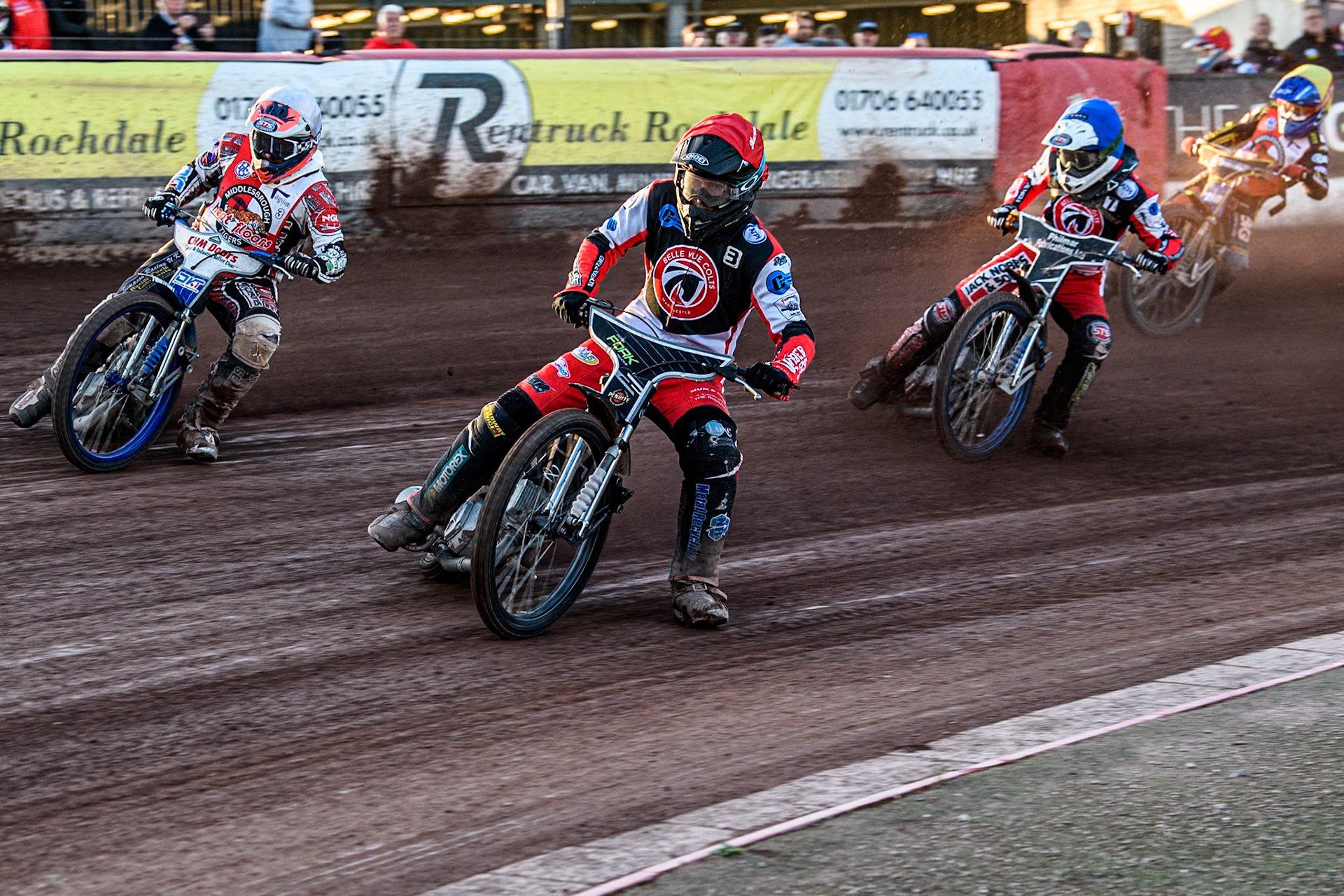 Belle Vue Colts' Matt Marson in Red leading Middlesbrough Tigers' Danny Phillips in White Belle Vue Colts' Jack Shimelt in Blue and Middlesbrough Tigers' William Hocaniuk in Yellow during the WSRA National Development League match between Belle Vue Colts and Middlesbrough Tigers at the National Speedway Stadium, Manchester on Monday 17th June 2024. (Photo: Ian Charles | MI News)