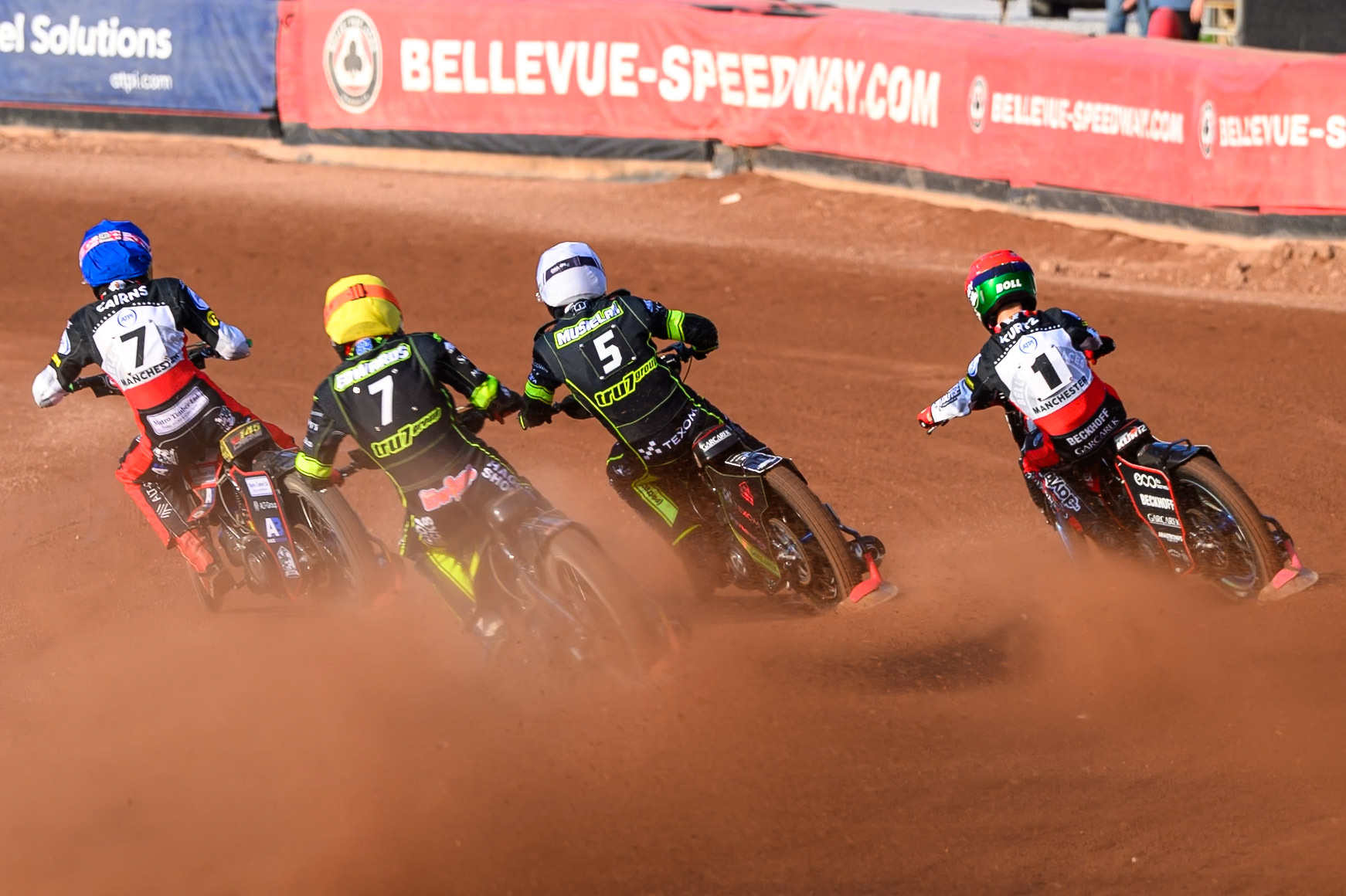 Jason Edwards of Ipswich Witches in Yellow chases Tobiasz Musielak of Ipswich Witches in White, William Cairns of Belle Vue Aces in Blue and Brady Kurtz of Belle Vue Aces in Red during the Rowe Motor Oil Premiership match between Belle Vue Aces and Ipswich Witches at the National Speedway Stadium, Manchester on Saturday 20th June 2026. (Photo: Ian Charles | MI News)