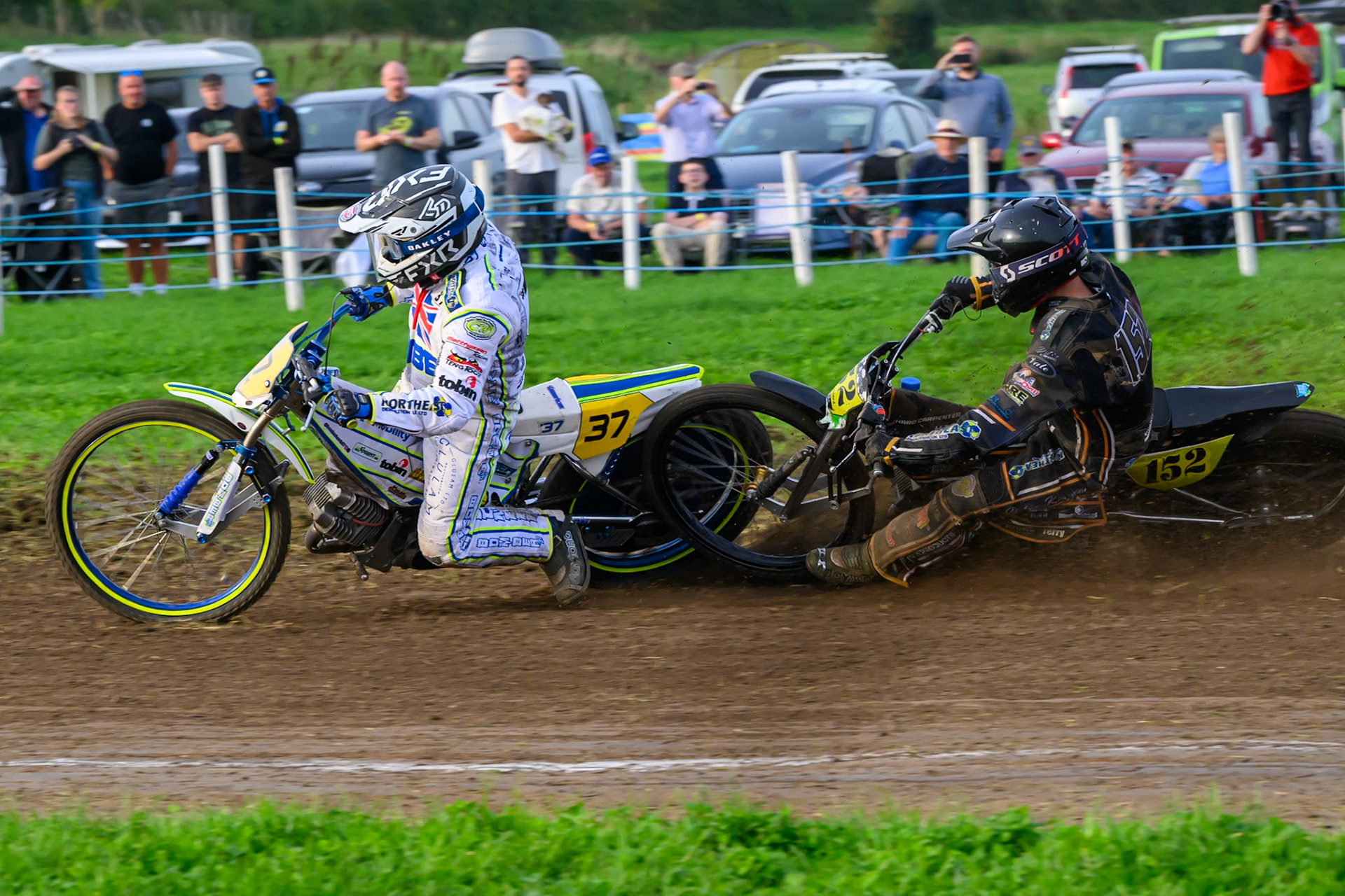 British Masters (Solos): Ashton Vale (152) catches the back wheel of Chris Harris (37)  and comes off during the British Masters Grasstrack Championship at Lower Marsh Farm, Much Hoole, Preston in Lancashire, England on Sunday 13th September 2026. (Photo: Ian Charles | MI News)