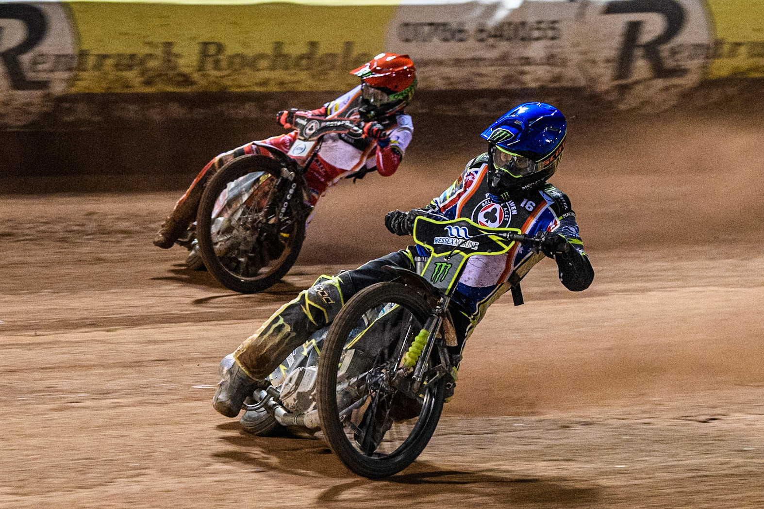 Chris Holder in Blue leading Dan Bewley in Red in the Grand Final during the Peter Craven Memorial Trophy at the National Speedway Stadium, Manchester on Monday 17th March 2025. (Photo: Ian Charles | MI News)