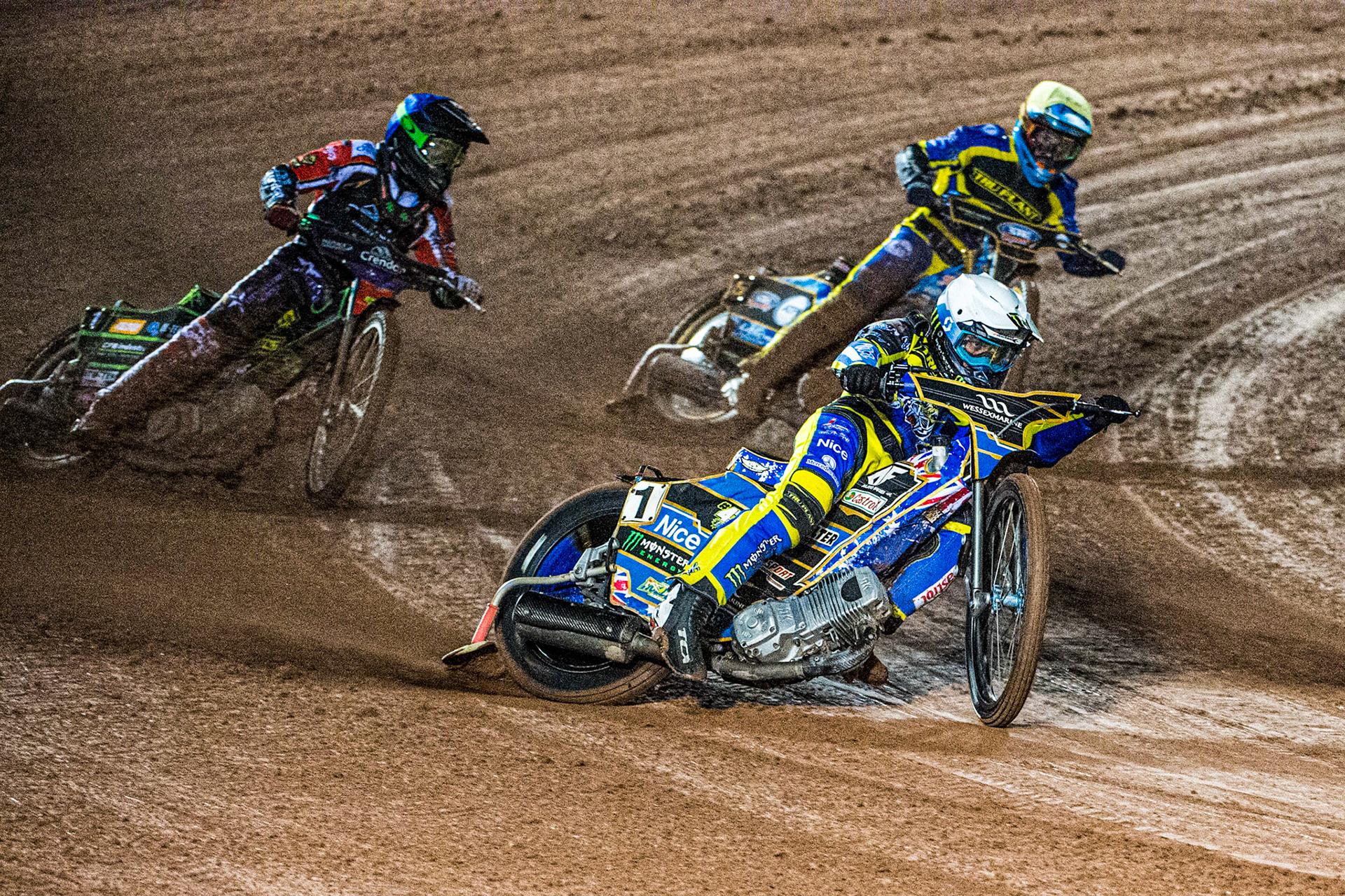 Jack Holder (White) leads Benjamin Basso (Blue) and Justin Sedgmen (Yellow)  during the Grant Henderson Pairs at the National Speedway Stadium, Manchester on Thursday 27th October 2022. (Credit: Ian Charles | MI NEWS)
