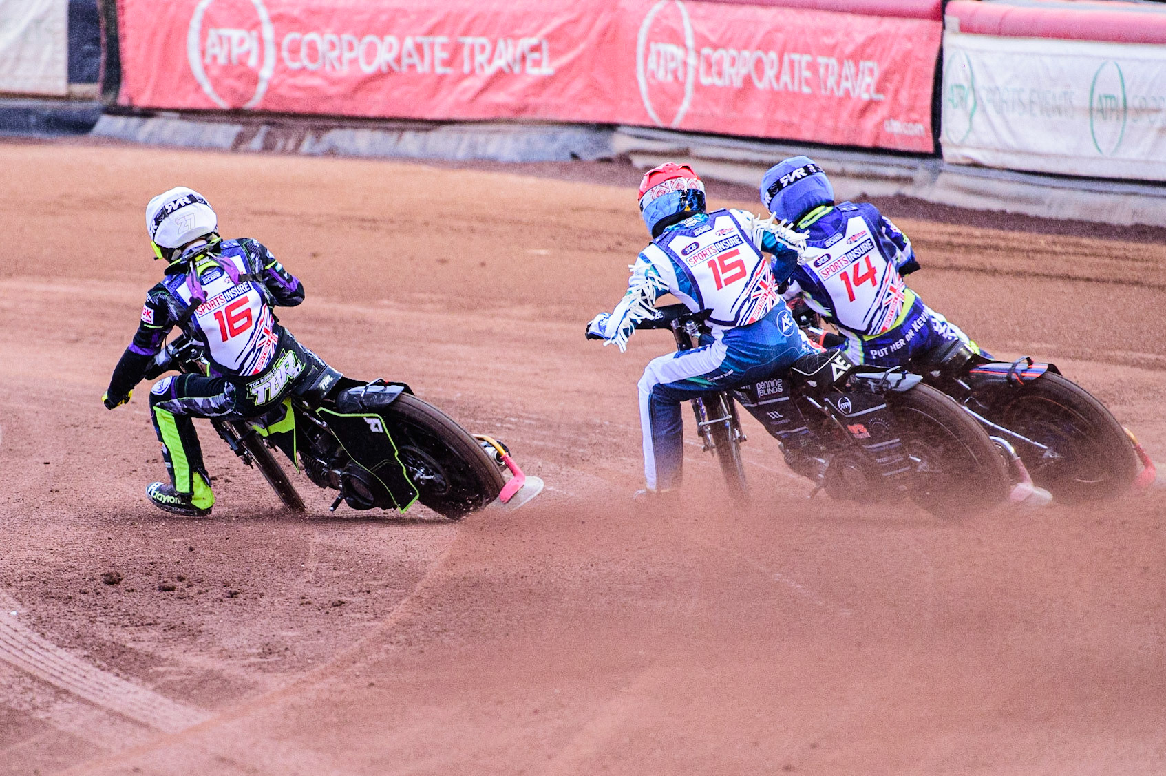 Tom Brennan (White) goes inside Adam Ellis  (Red) and Scott Nicholls (Blue) during the Sports Insure British Speedway Championship Final at the National Speedway Stadium, Bellevue, Manchester, England on Monday 1st August 2022. (Photo by: Ian Charles | MI News)