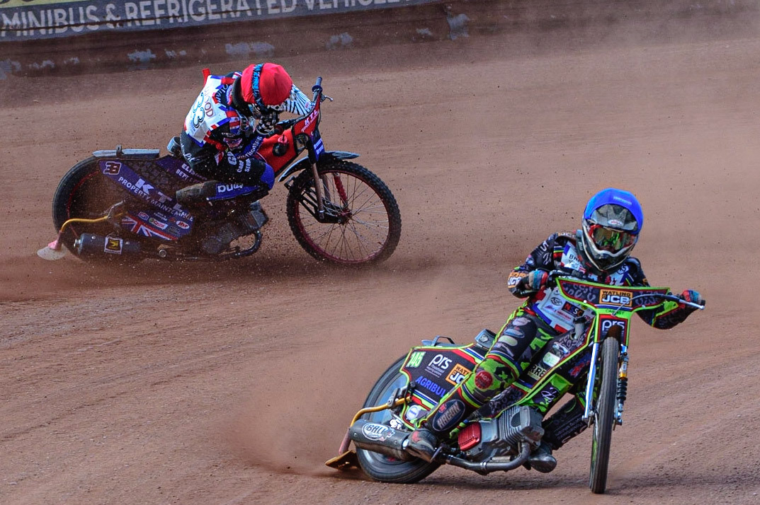 MANCHESTER, UK. JUN 3RD Charlie Wood (33) (Red) crashes behind William Cairns (145)  (Blue) during the British Youth Speedway Championship (Round 4)  at the National Speedway Stadium, Manchester on Friday 3rd June 2022. (Credit: Ian Charles | MI News)