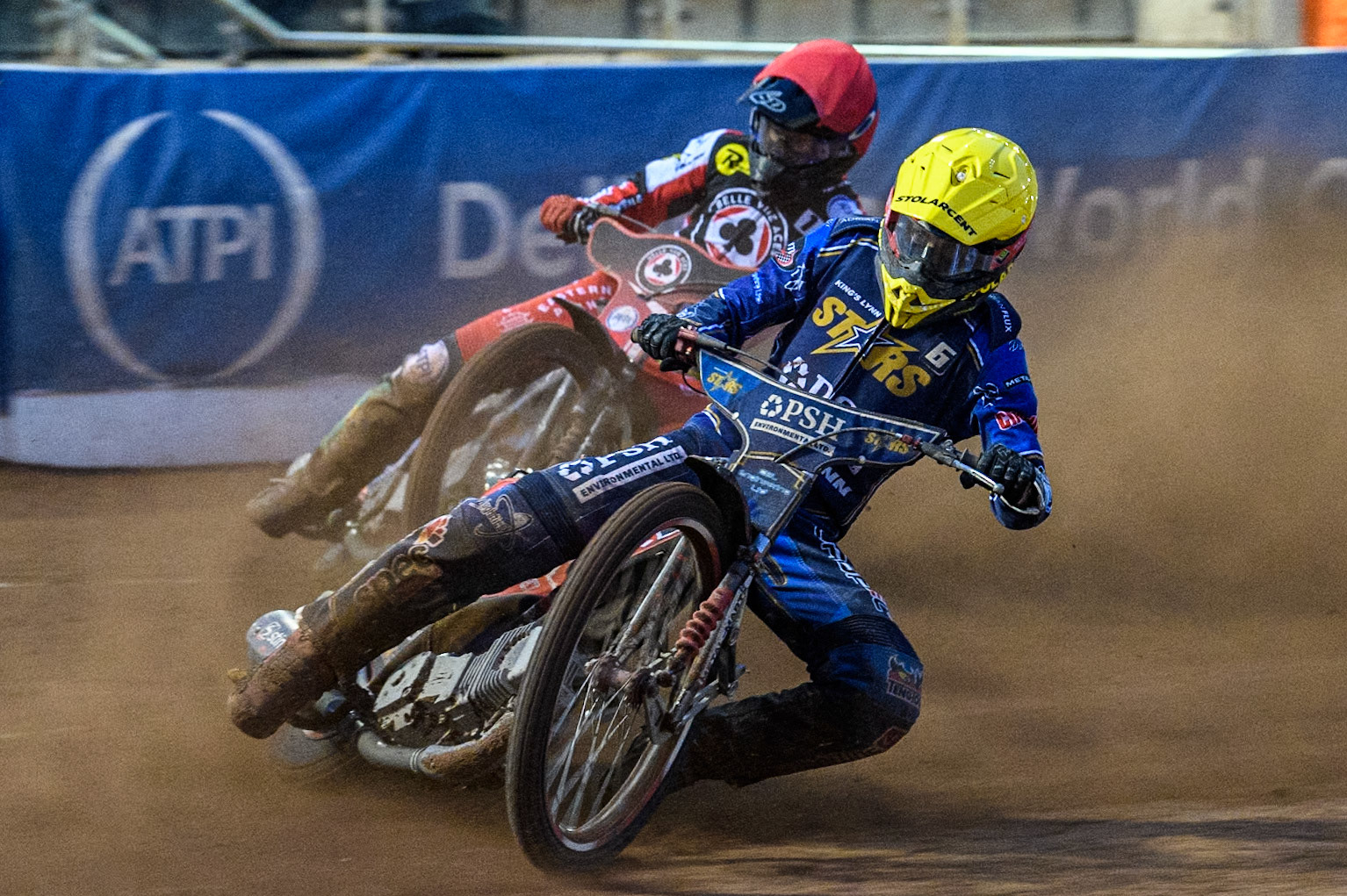 King Lynn Stars' Patryk Wojdylo in Yellow leading Belle Vue Aces' Brady Kurtz in Red during the Rowe Motor Oil Premiership match between Belle Vue Aces and King's Lynn Stars at the National Speedway Stadium, Manchester on Monday 20th May 2024. (Photo: Ian Charles | MI News)