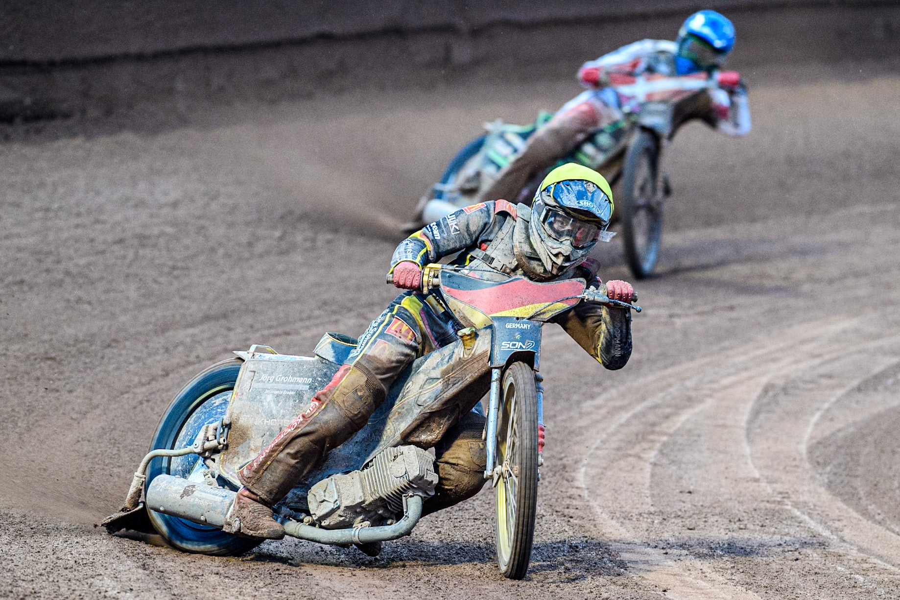 Norick Blödorn of Germany in Yellow leading Bastian Pedersen of Denmark in Blue during the Monster Energy FIM Speedway of Nations 2 (Under 21) Final at the National Speedway Stadium, Manchester on Friday 12th July 2024. (Photo: Ian Charles | MI News)