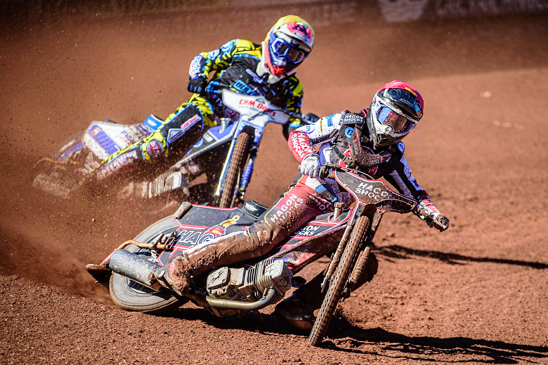 Sam Hagon  (Red) leads Danny Phillips  (Yellow) during the National Development League match between Belle Vue Colts and Berwick Bullets at the National Speedway Stadium, Manchester on Friday 7th April 2023. (Photo: Ian Charles | MI News)