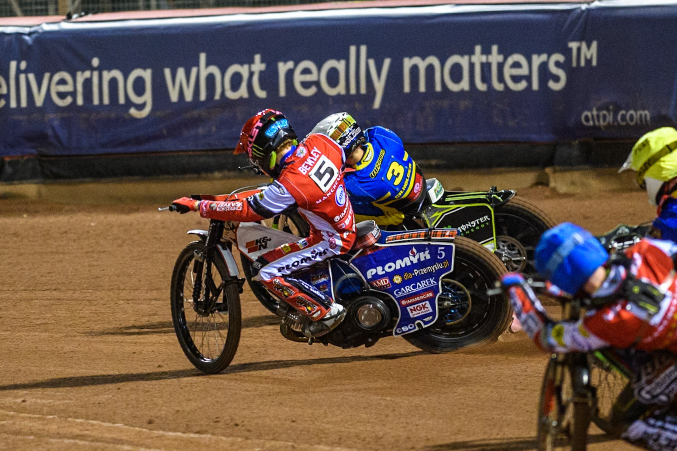 Belle Vue Aces' Dan Bewley  in Red rides inside Sheffield Tigers' Chris Holder  in White during the Rowe Motor Oil Premiership Play Off Semi Final 2, 1st Leg match between Belle Vue Aces and Sheffield Tigers at the National Speedway Stadium, Manchester on Monday 16th September 2024. (Photo: Ian Charles | MI News)