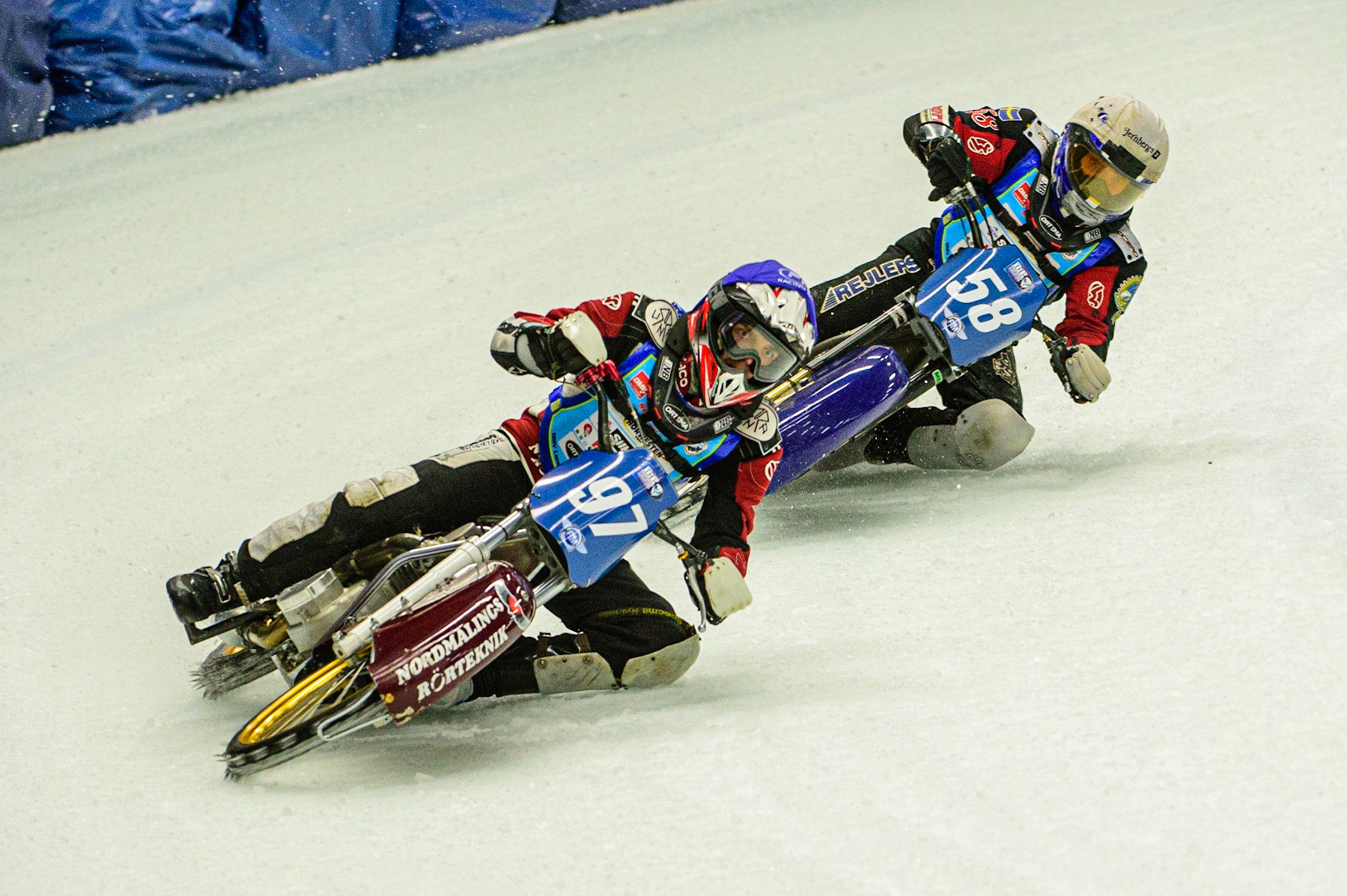 Ove Ledström (Blue)  leads  Stefan Svensson (White) during the Race of Legends at the Max-Aicher-Arena, Inzell on Friday 17th March 2023. (Photo: Ian Charles | MI News)