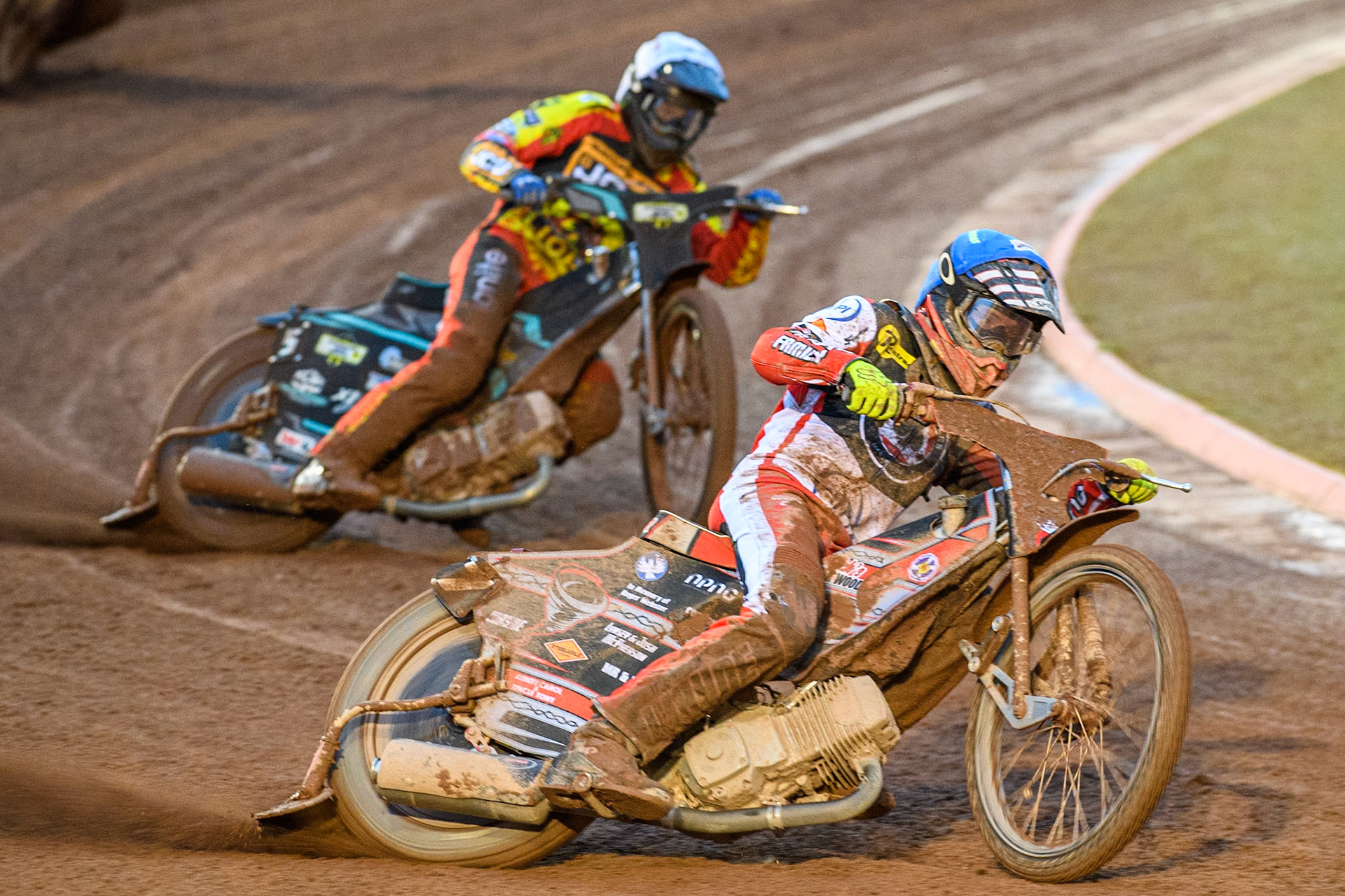 Connor Bailey of Belle Vue Aces in Blue leading Ryan Douglas of Leicester Lions in White during the Rowe Motor Oil Premiership match between Belle Vue Aces and Leicester Lions at the National Speedway Stadium, Manchester on Saturday 6th April 2024. (Photo: Ian Charles | MI News)