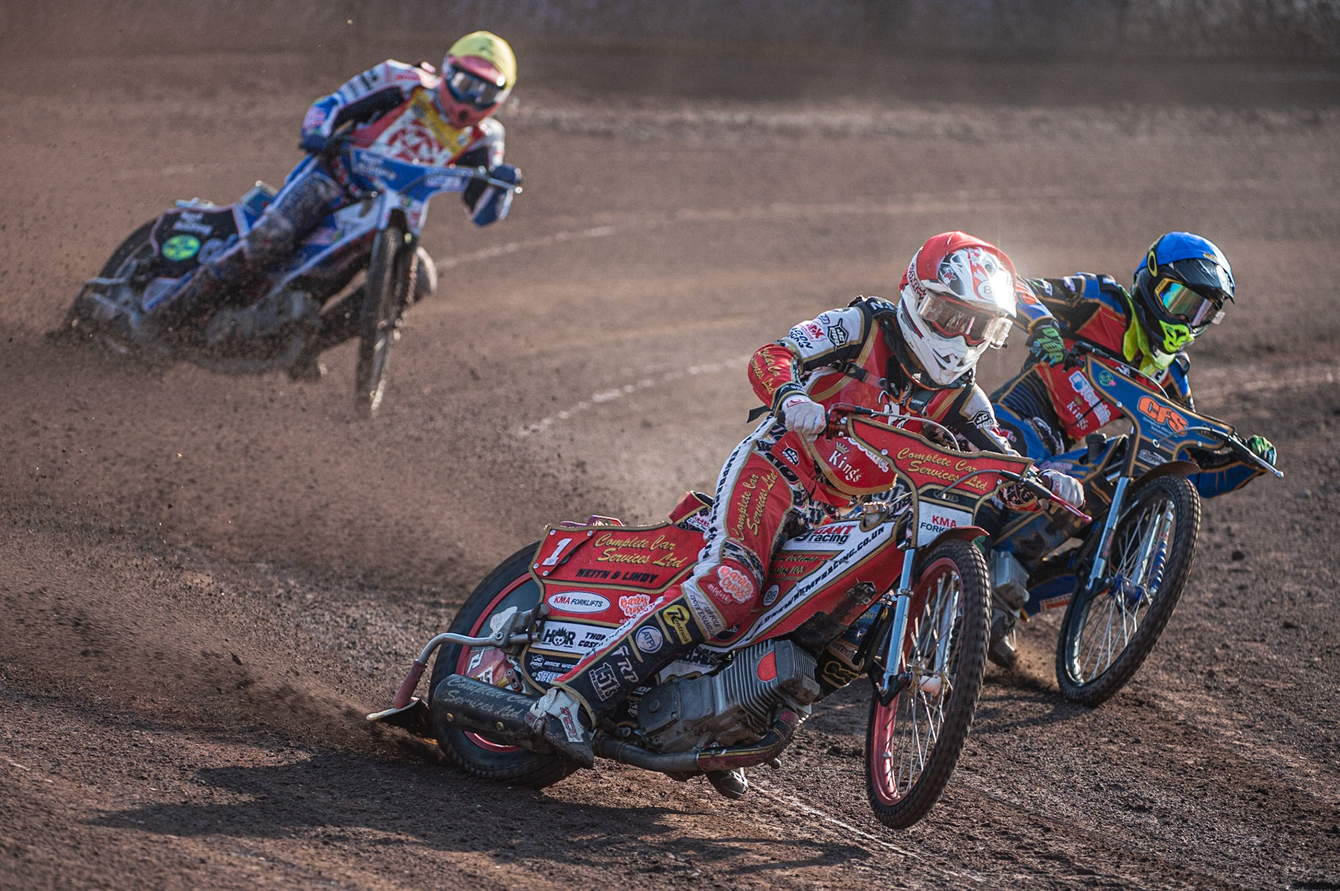 Photo by Ian Charles:

KENT v STOKE 
Drew Kemp  (Red) picks up some drive outside Anders Rowe  with Tom Perry (Yellow) behind


National League Best pairs Championship, Owlerton Stadium, Sheffield, 25 August 2019