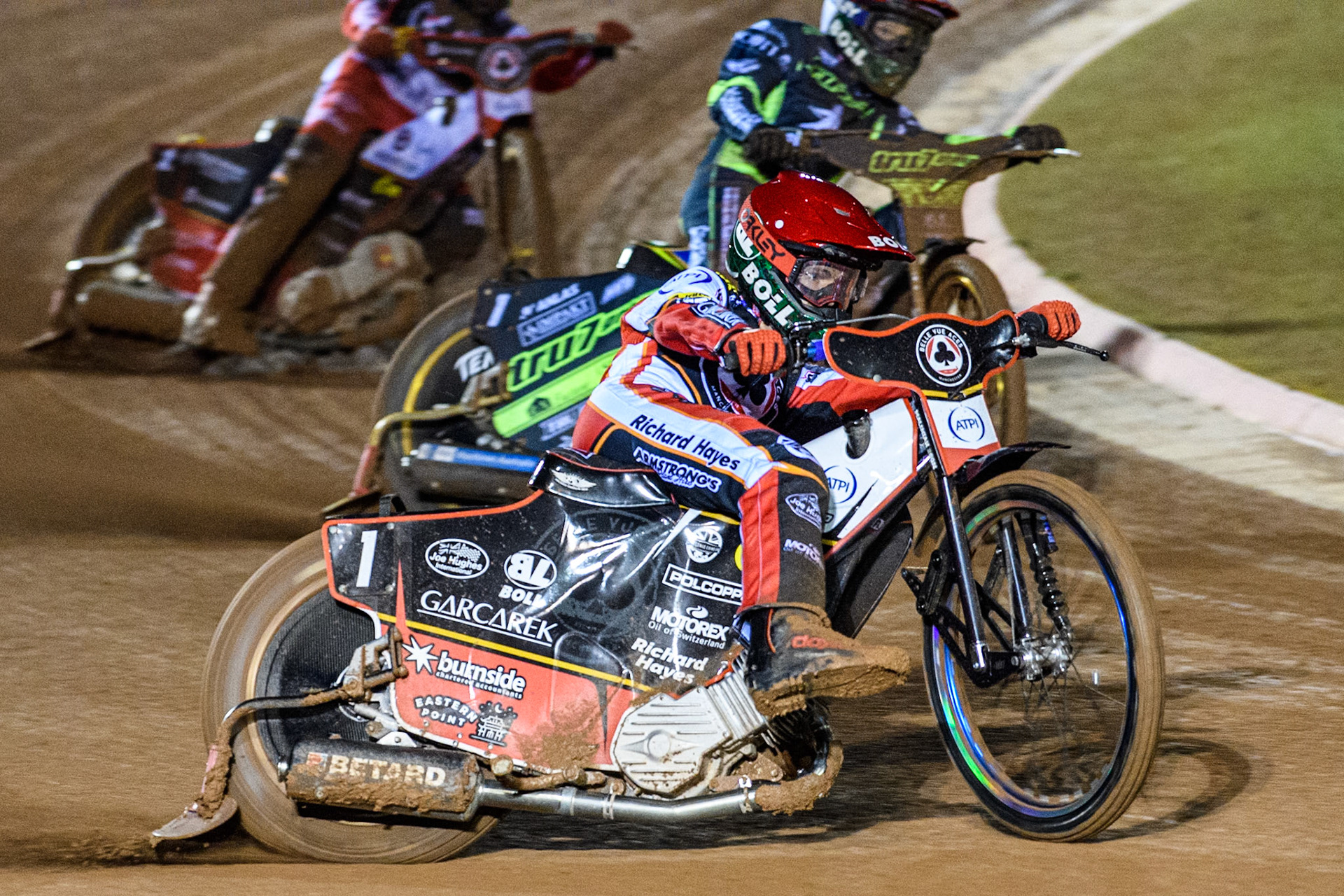 Brady Kurtz of Belle Vue Aces in Red leading Jason Doyle of Ipswich Witches in White during the Premiership Cup Quarter Final 1st Leg match between Belle Vue Aces and Ipswich Witches at the National Speedway Stadium, Manchester on Monday 24th March 2025. (Photo: Ian Charles | MI News)