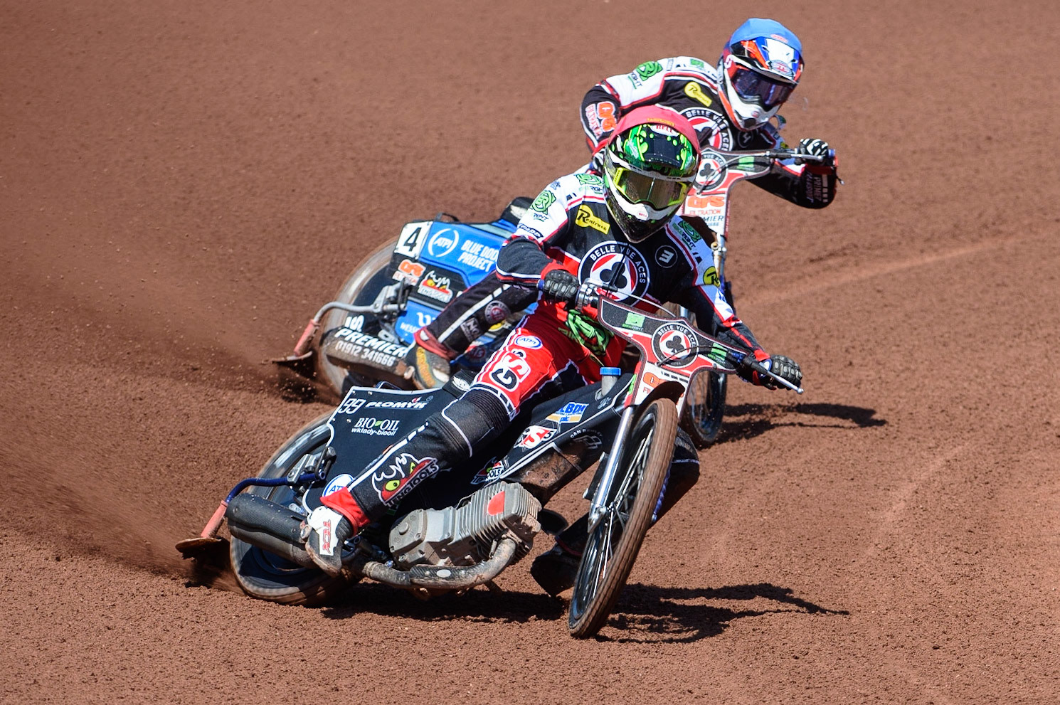 MANCHESTER, UK. MAY 31ST  Dan Bewley  (Red) and Steve Worrall  (Blue) on their way to a 5-1 maximum heat win for the Belle Vue BikeRight Aces  during the SGB Premiership match between Belle Vue Aces and Peterborough at the National Speedway Stadium, Manchester on Monday 31st May 2021. (Credit: Ian Charles | MI News)