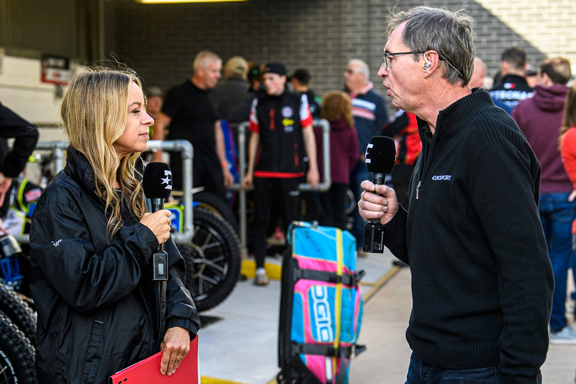 Eurosport presenters Abi Stephens (left) and Kelvin Tatum record the programme openingduring the Sports Insure Premiership match between Belle Vue Aces and Ipswich Witches at the National Speedway Stadium, Manchester on Monday 17th July 2023. (Photo: Ian Charles | MI News)