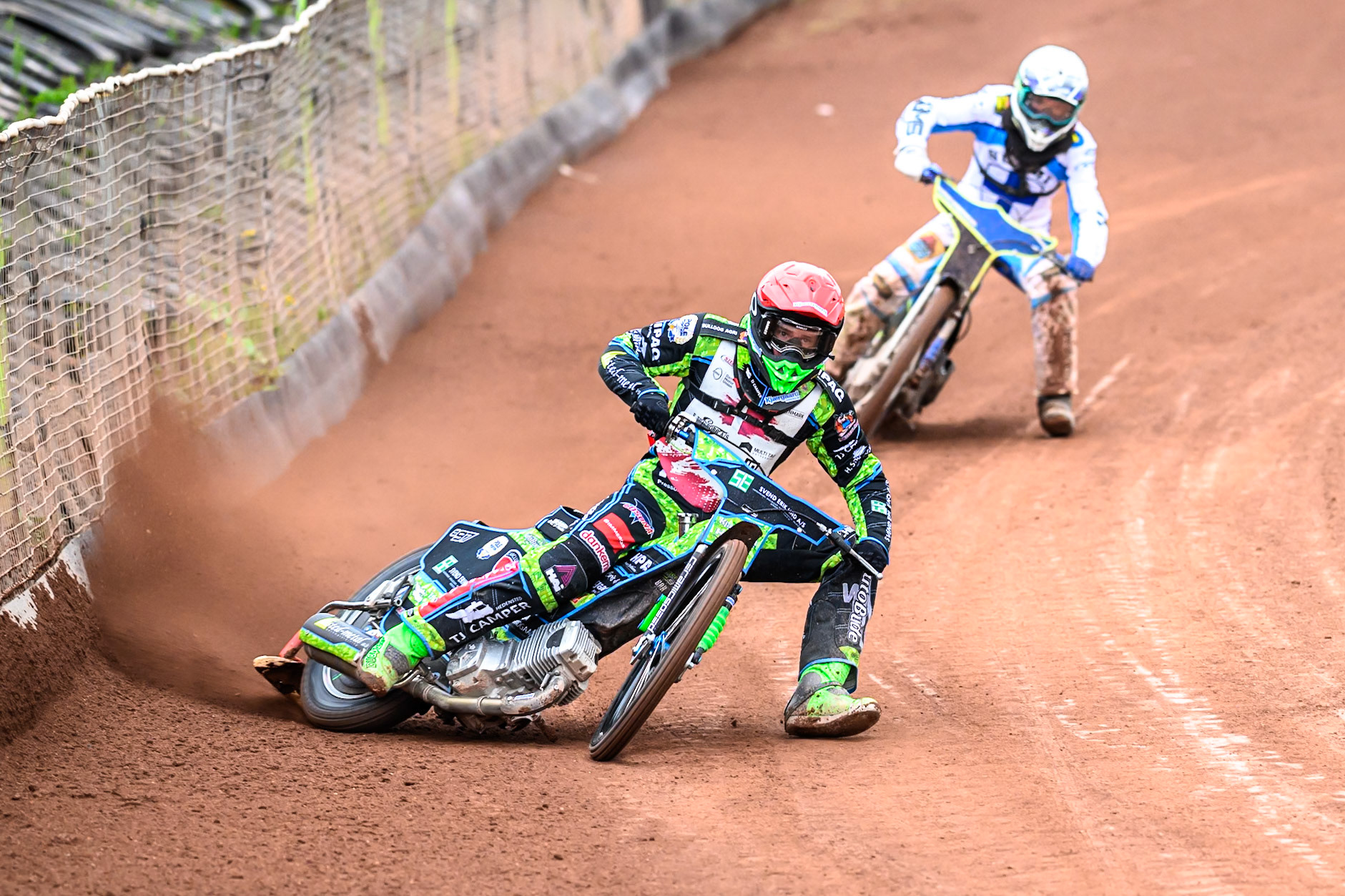 Mikkel Andersen of Denmark in Red leading Otto Raak of Finland in White during the FIM SGP2 Qualifying Round at the Peugeot Ashfield Stadium in Glasgow on Saturday 24th May 2025. (Photo: Ian Charles | MI News)
