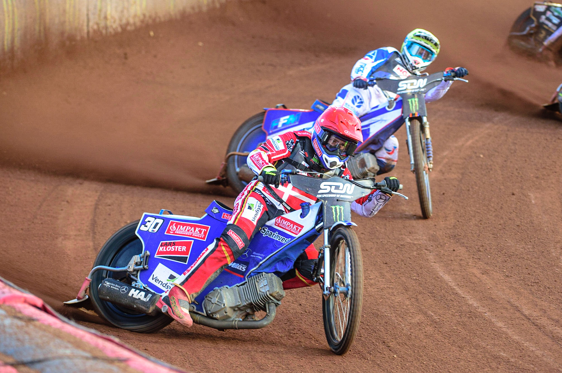 MANCHESTER, UK. OCT 16TH Leon Madsen of Denmark (Red) leads Dmitri Berge of France (Yellow) during the Monster Energy FIM Speedway of Nations at the National Speedway Stadium, Manchester on Saturday  16th October 2021. (Credit: Ian Charles | MI News)