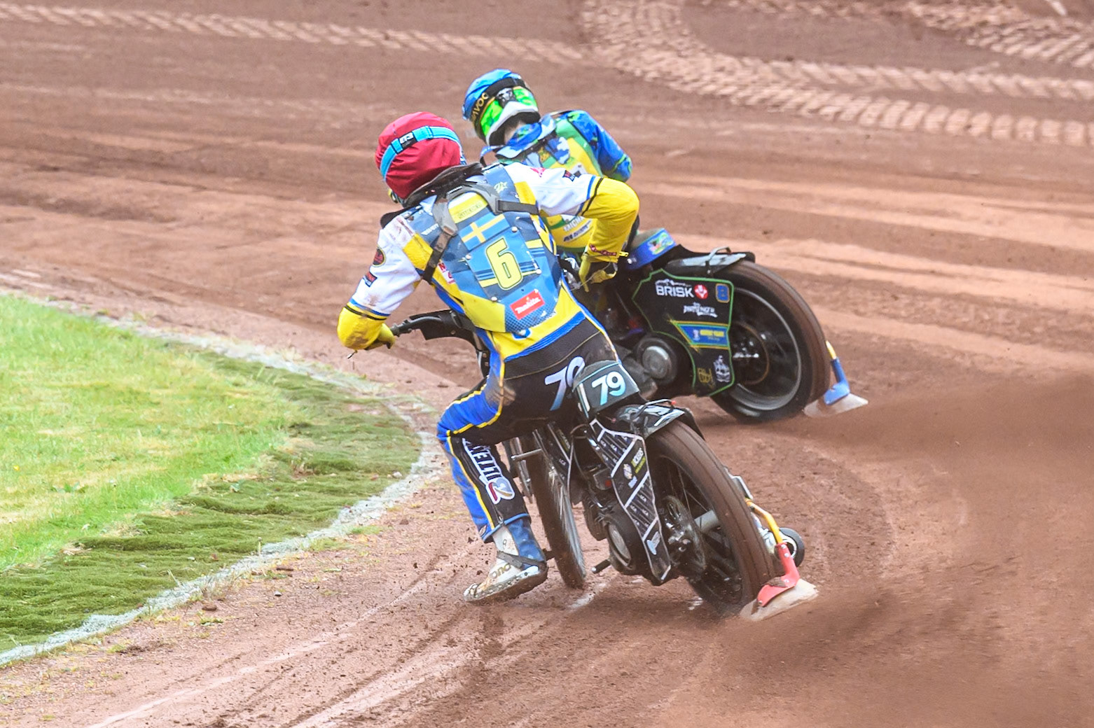 Noel Wahlquist of Sweden in Red chases Michael West of Australia in Blue during the FIM SGP2 Qualifying Round at the Peugeot Ashfield Stadium in Glasgow on Saturday 24th May 2025. (Photo: Ian Charles | MI News)