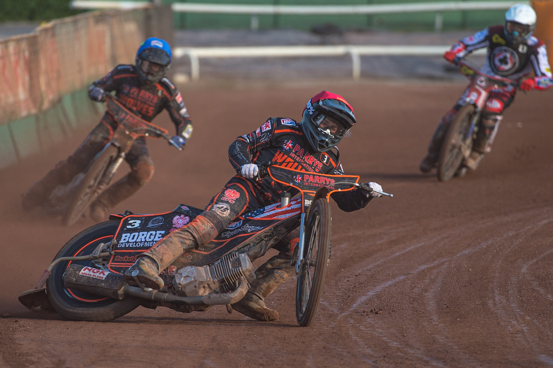 WOLVERHAMPTON, UK. JUN 20TH Luke Bekker  (Red) and Ryan Douglas (Blue) lead Matej Zagar   (White) during the SGB Premiership match between Wolverhampton Wolves and Belle Vue Aces at Monmore Green Stadium, Wolverhampton on Monday 20th June 2022. (Credit: Ian Charles | MI News)