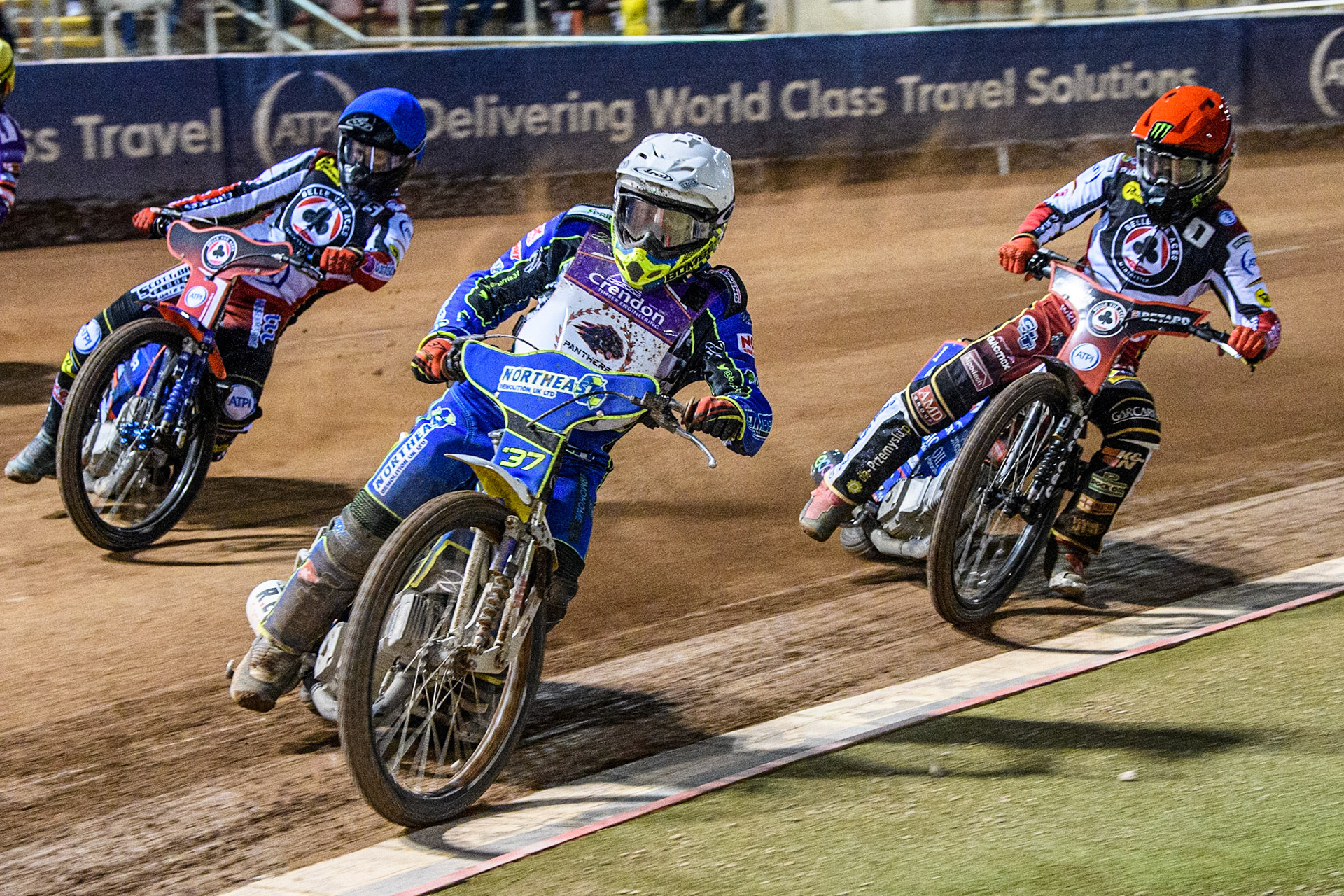 Chris Harris   (White) leads Dan Bewley  (Red) and Brady Kurtz  (Blue) during the SGB Premiership match between Belle Vue Aces and Peterborough at the National Speedway Stadium, Manchester on Monday 24th April 2023. (Photo: Ian Charles | MI News)