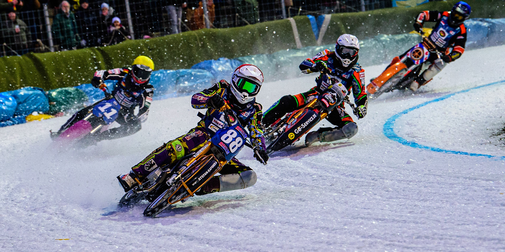 Max Neidermaier (Red) leads Markus Jell (White), Benedikt Monn (Yellow) and Sebastian Reitsma (Blue) during the German Individual Ice Speedway Championship at Horst-Dohm-Eisstadion, Berlin on Friday 3rd March 2023. (Photo: Ian Charles | MI News)