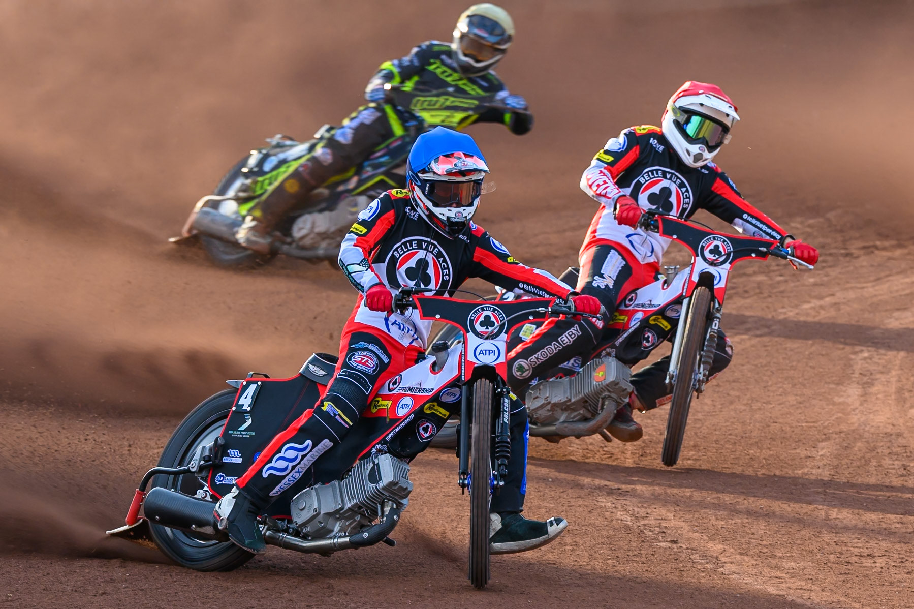 Zach Cook of Belle Vue Aces in Blue leading Peter Kildemand of Belle Vue Aces in Red and Richard Lawson of Ipswich Witches in White during the Rowe Motor Oil Premiership match between Belle Vue Aces and Ipswich Witches at the National Speedway Stadium, Manchester on Saturday 20th June 2026. (Photo: Ian Charles | MI News)