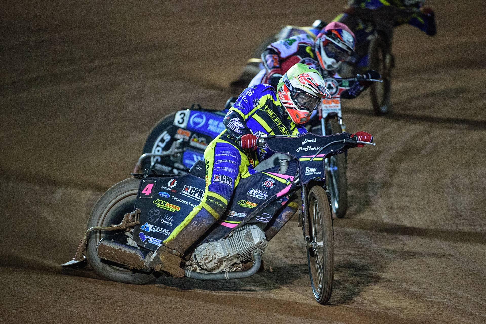 MANCHESTER, UK. OCT 7TH  Josh Pickering   (Yellow) leads Steve Worrall   (Red) and Kyle Howarth  (White) during the SGB Premiership Play off Semi-Final Second Leg between Belle Vue Aces and Sheffield Tigers at the National Speedway Stadium, Manchester on Thursday 7th October 2021. (Credit: Ian Charles | MI News)