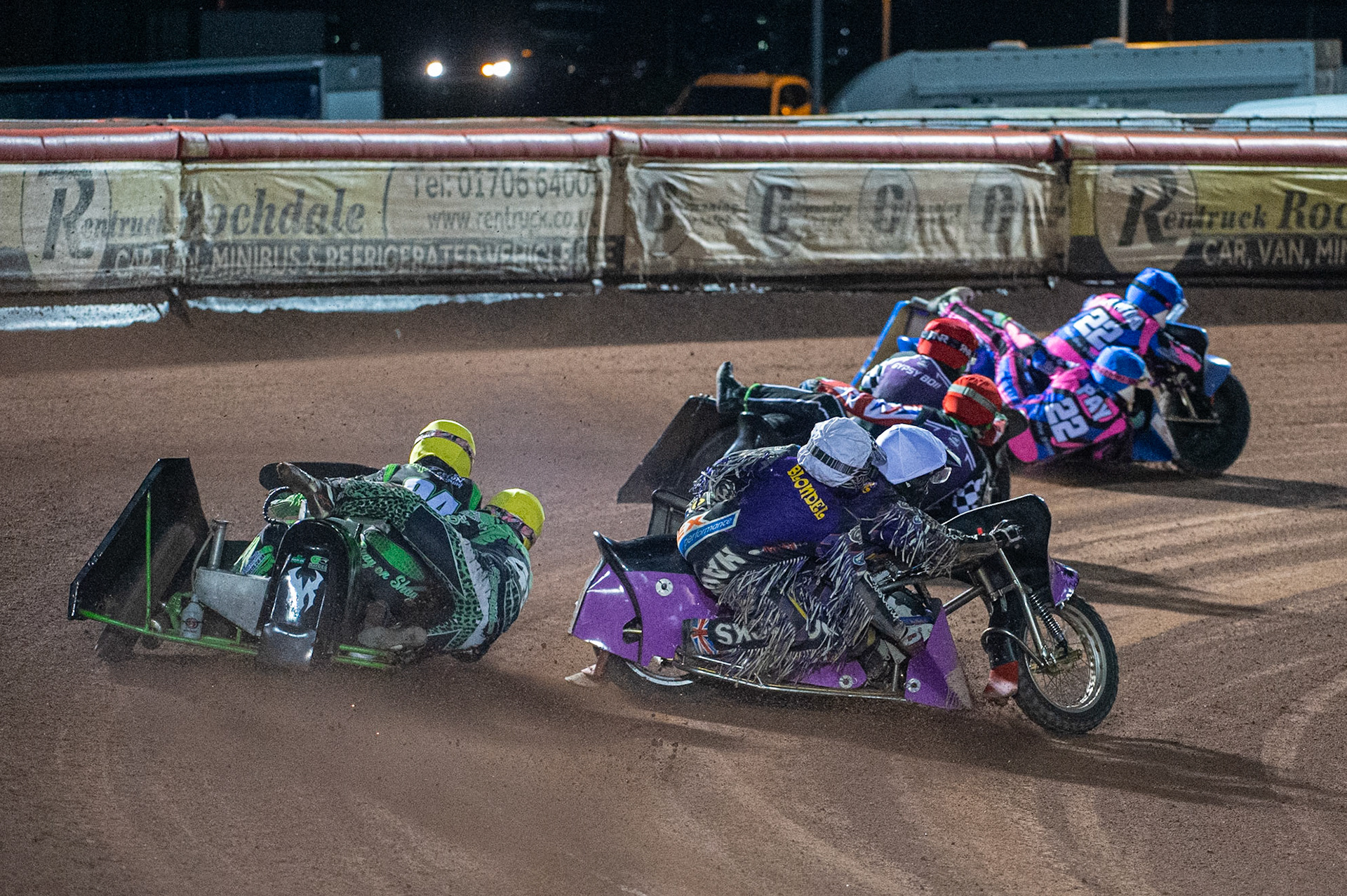 MANCHESTER, ENGLAND  Billy Winterburn & Ryan Wharton(94) (Yellow) chase Clint Blondel & Richard Webb(10) (White), Nevill Penfold & Kev Jones(2) (Red) ,  and Will Penfold & Ricky Pay(22) (Blue) during the  ACU Sidecar Speedway Manchester Masters,  Belle Vue National Speedway Stadium, Manchester Saturday 12 October 2019 (Credit: Ian Charles | MI News)