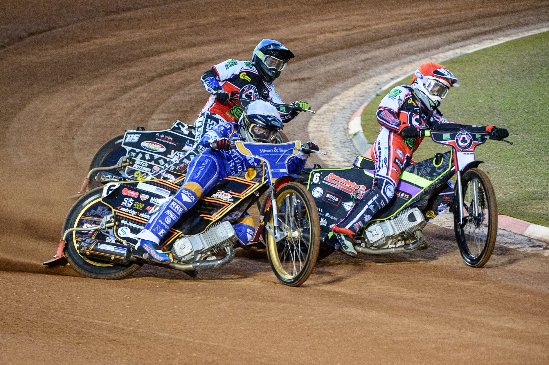 MANCHESTER, UK. SEPT 13TH  Connor Mountain (White) outside Tom Brennan  (Red) and Theo Peiper (Blue) during the SGB Premiership match between Belle Vue Aces and King's Lynn Stars at the National Speedway Stadium, Manchester on Monday 13th September 2021. (Credit: Ian Charles | MI News)