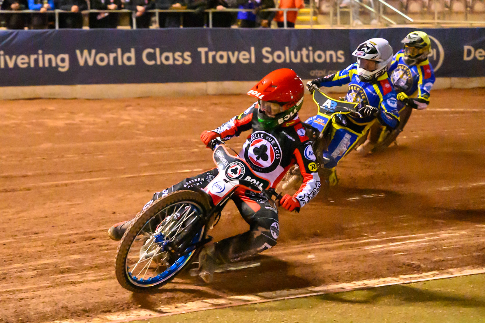 Brady Kurtz of Belle Vue Aces  in Red leading Jye Etheridge of Sheffield Tigers    in White and Josh Pickering of Sheffield Tigers    in Yellow during the Knockout Cup, Northern Section match between Belle Vue Aces and Sheffield Tigers at the National Speedway Stadium, Manchester on Monday 30th March 2026. (Photo: Ian Charles | MI News)