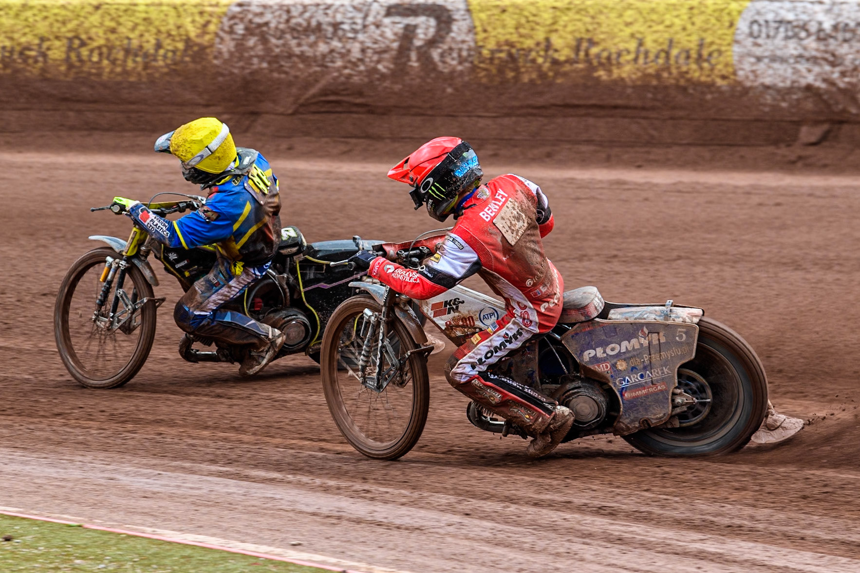 Sheffield Tigers' Guest rider Tom Brennan in Yellow leading Belle Vue Aces' Dan Bewley in Red during the Rowe Motor Oil Premiership match between Belle Vue Aces and Sheffield Tigers at the National Speedway Stadium, Manchester on Monday 27th May 2024. (Photo: Ian Charles | MI News)
