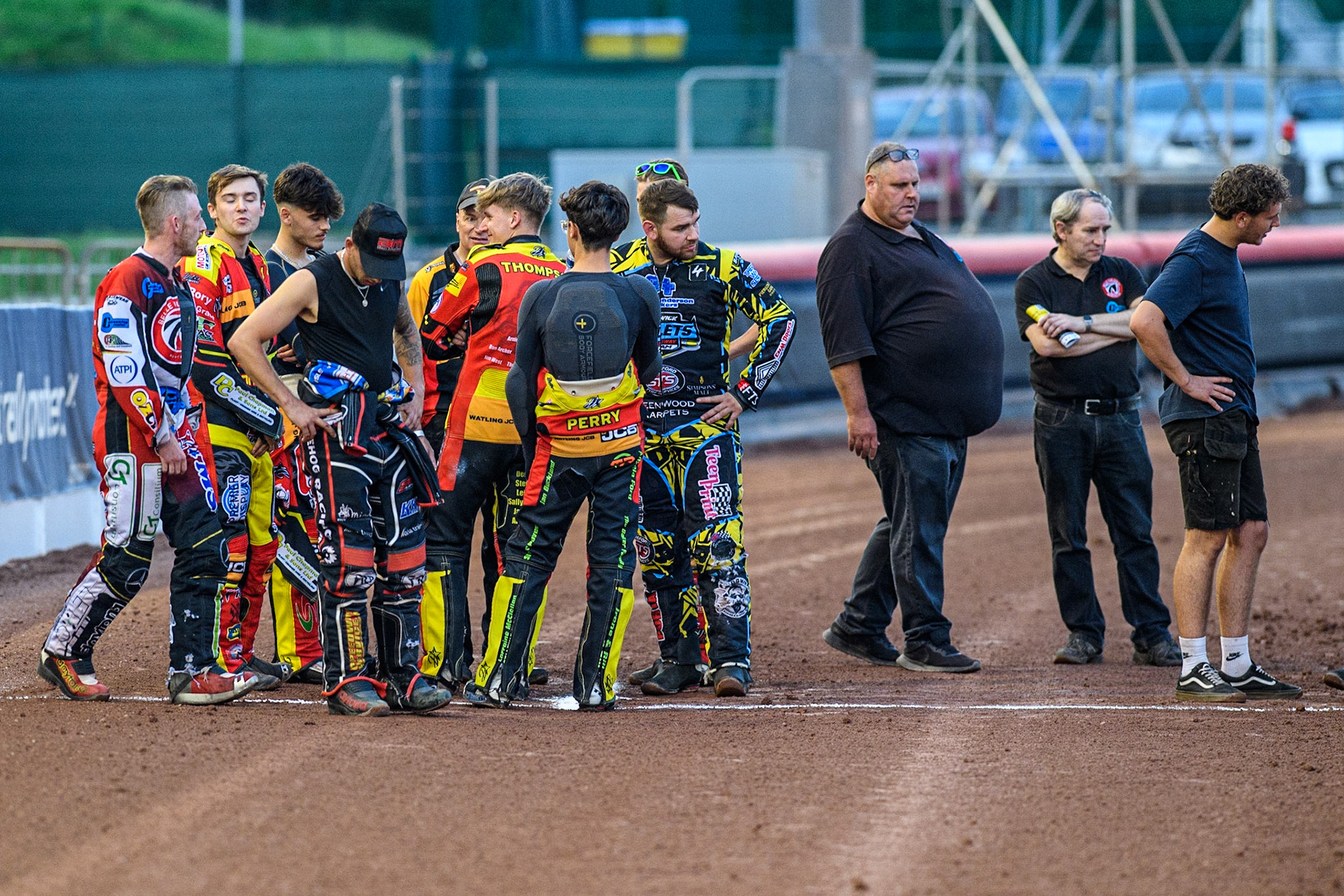 The riders and managers  inspect the track at the start line after the extended period of track preparation during the National Development League match between Belle Vue Colts and Leicester Lion Cubs at the National Speedway Stadium, Manchester on Friday 8th September 2023. (Photo: Ian Charles | MI News)