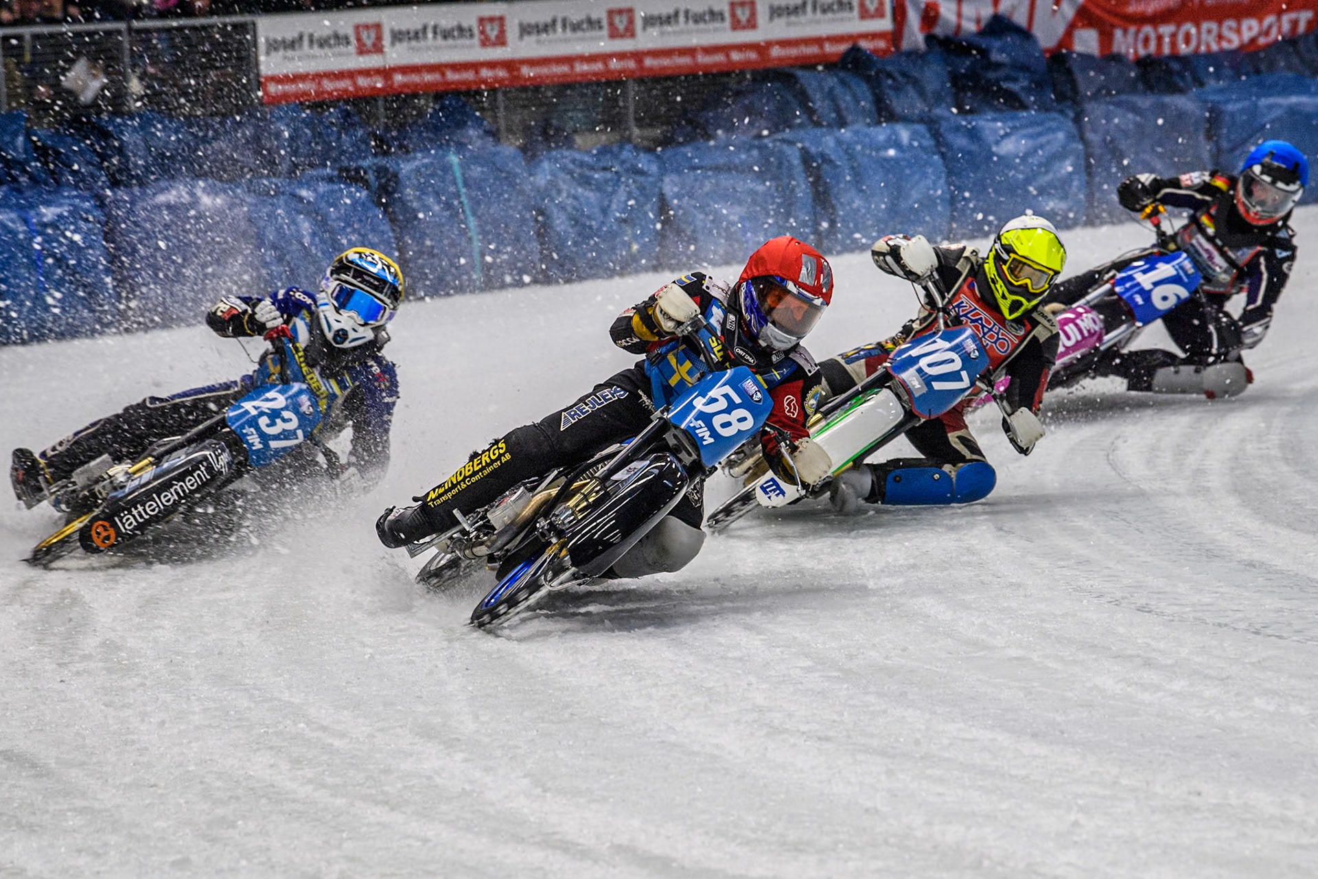 Sweden's Stefan Svensson (58) (Red) leads  Sweden's Jimmy Hörnell Lidfalk (237) (Yellow) Czech Republic's Andrej Diviš (107) (White) and Germany's Benedikt Monn (16) (Blue) during the FIM Ice Speedway Gladiators World Championship Final 2 at the Max-Aicher-Arena, Inzell on Sunday 24 March 2024. (Photo: Ian Charles | MI News)