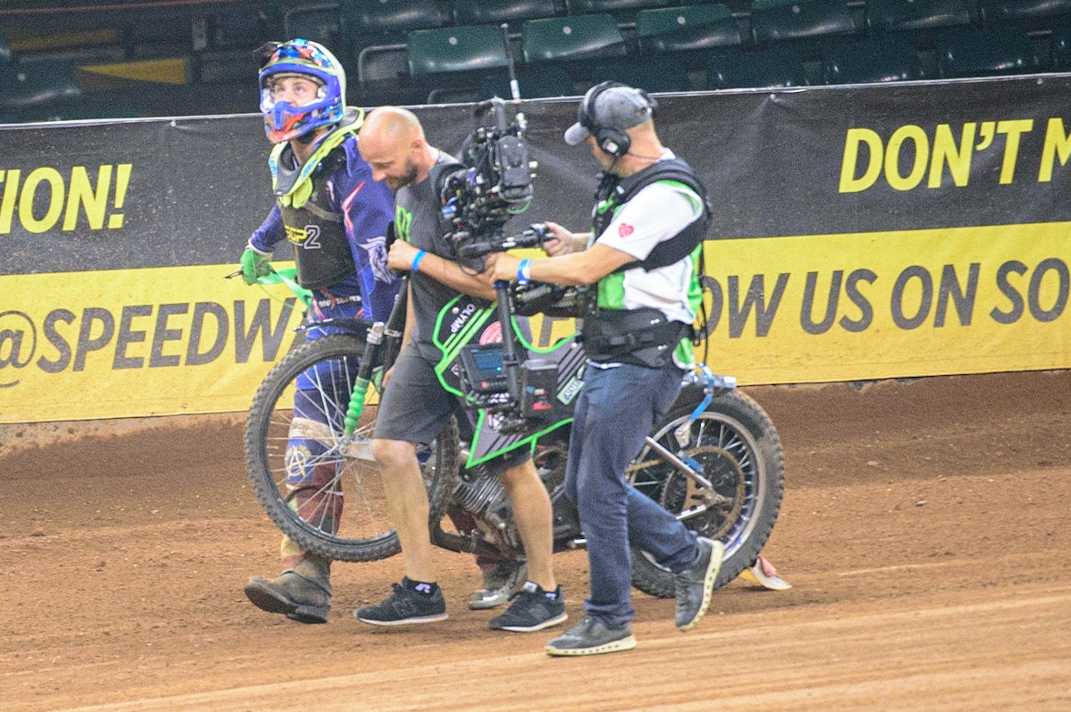 \717 helps his mechanic carry the damaged bike back to the pits after his fall during the FIM  Speedway Grand Prix  2 of Great Britain at the Principality Stadium, Cardiff on Sunday 14th August 2022. (Credit: Ian Charles | MI News)