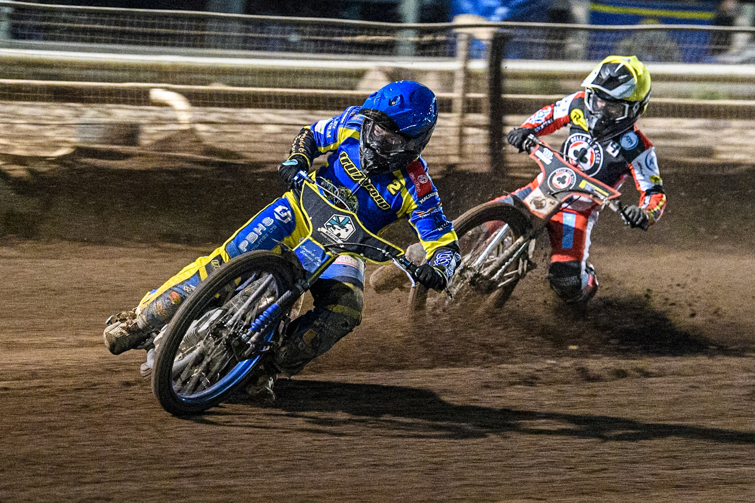 Sheffield Tigers' Kyle Howarth  in Blue leading Belle Vue Aces' Ben Cook  in Yellow during the Rowe Motor Oil Premiership Play Off Semi Final 2nd leg between Sheffield Tigers and Belle Vue Aces at Owlerton Stadium, Sheffield on Thursday 19th September 2024. (Photo: Ian Charles | MI News)