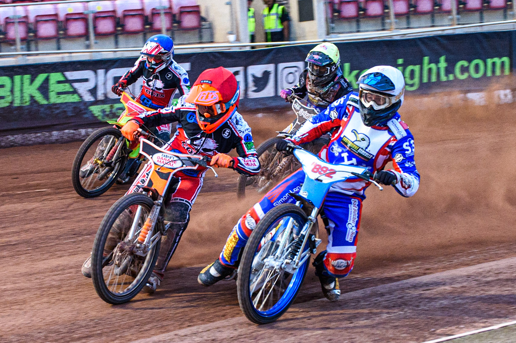 MANCHESTER, UK. JULY 23RD Jake Knight  (White) inside Connor Coles  (Red) with Ben Woodhull  (Blue) and Connor King  (Yellow) behind during the National Development League match between Belle Vue Colts and Eastbourne Seagulls at the National Speedway Stadium, Manchester on Friday 23rd July 2021. (Credit: Ian Charles | MI News)