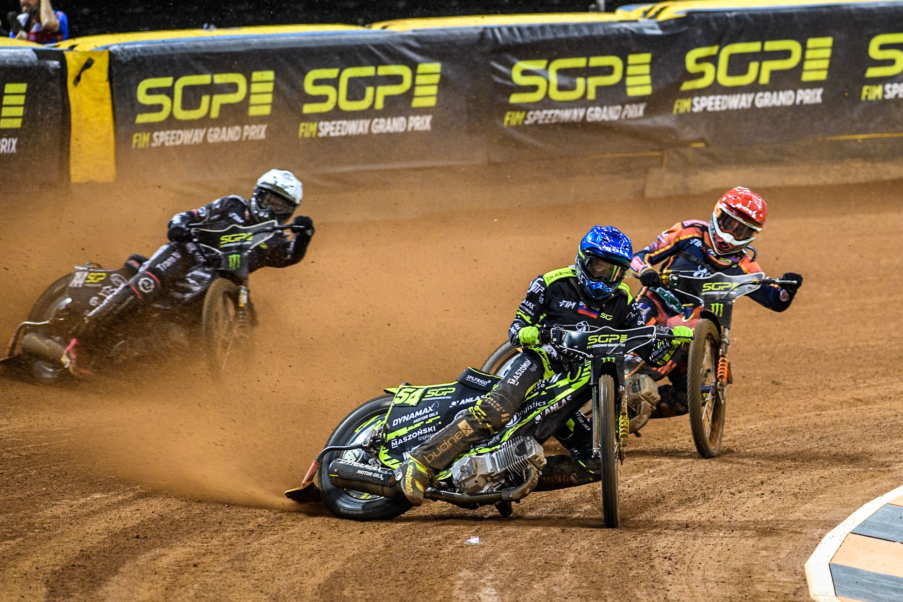 Martin Vaculik (54) of Slovakia in Blue leading Mikkel Michelsen (155) of Denmark in Red and Kai Huckenbeck (744) of Germany in White during the FIM Speedway Grand Prix of Great Britain at The Principality Stadium, Cardiff on Saturday 17th August 2024. (Photo: Ian Charles | MI News)