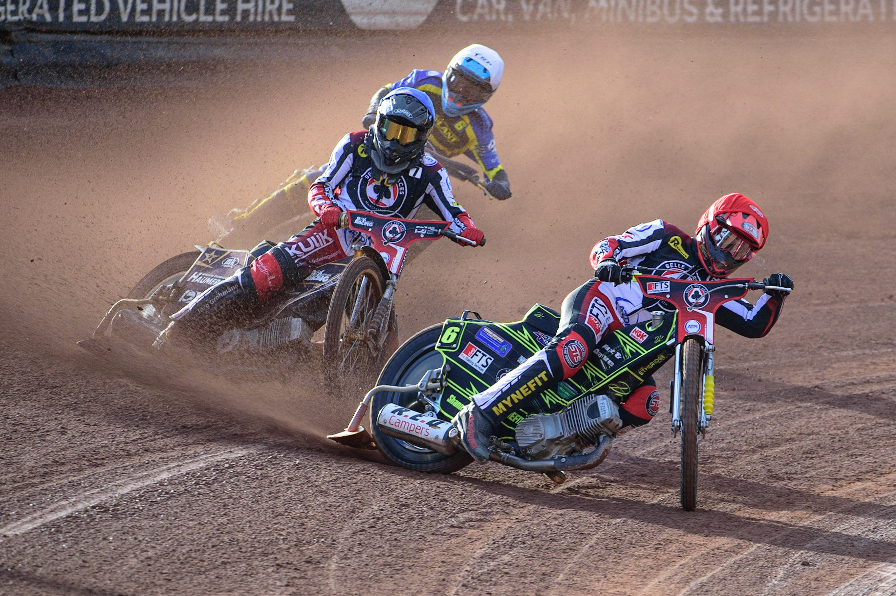 MANCHESTER, UK. JUL 5TH  Jye Etheridge  (Red) leads Norick Blodorn  (Blue) and Justin Sedgmen  (White) during the SGB Premiership match between Belle Vue Aces and Sheffield Tigers at the National Speedway Stadium, Manchester on Tuesday 5th July 2022. (Credit: Ian Charles | MI News)