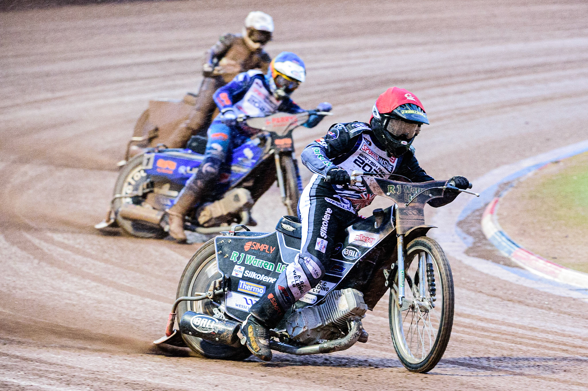 Danny King  (Red) leads Steve Worrall  (Blue) and Lewis Kerr  (White) during the Sports Insure British Speedway Championship Final at the National Speedway Stadium, Bellevue, Manchester, England on Monday 1st August 2022. (Photo by: Ian Charles | MI News)