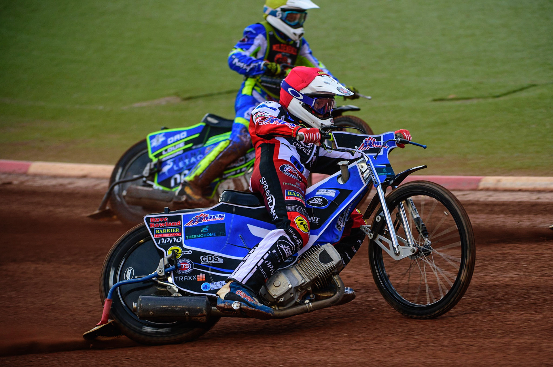 Archie Freeman  (Red) outside Luke Muff  (Yellow) during the National Development League match between Belle Vue Colts and Mildenhall Fens Tigers at the National Speedway Stadium, Manchester on Friday 15th July 2022. (Credit: Ian Charles | MI News)