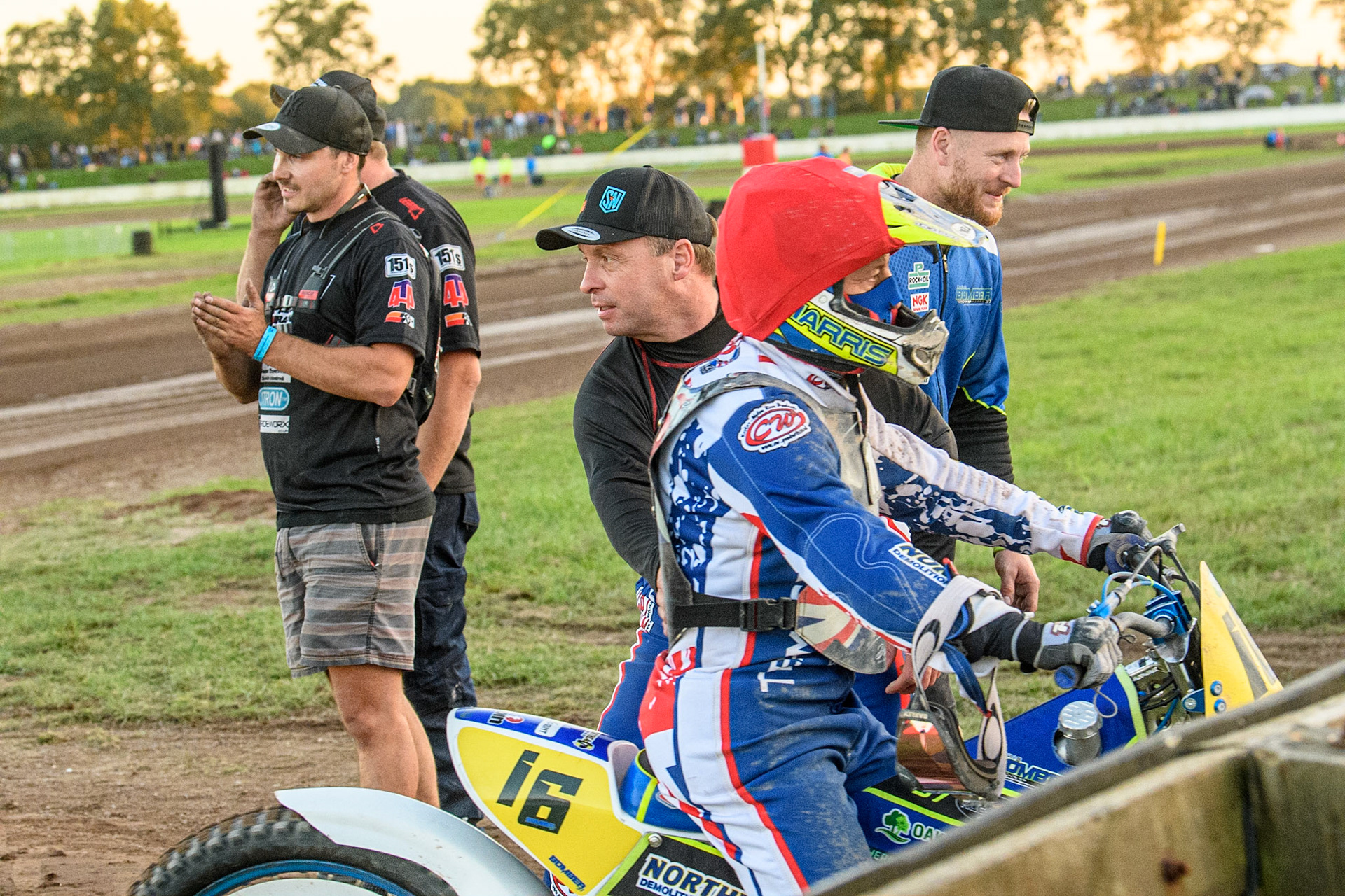 Chris Harris is congratulated by British Team Manager Paul Hurry during the FIM Long Track Of Nations event at the Speed Centre Roden on Sunday 24th September 2023. (Photo: Ian Charles | MI News)