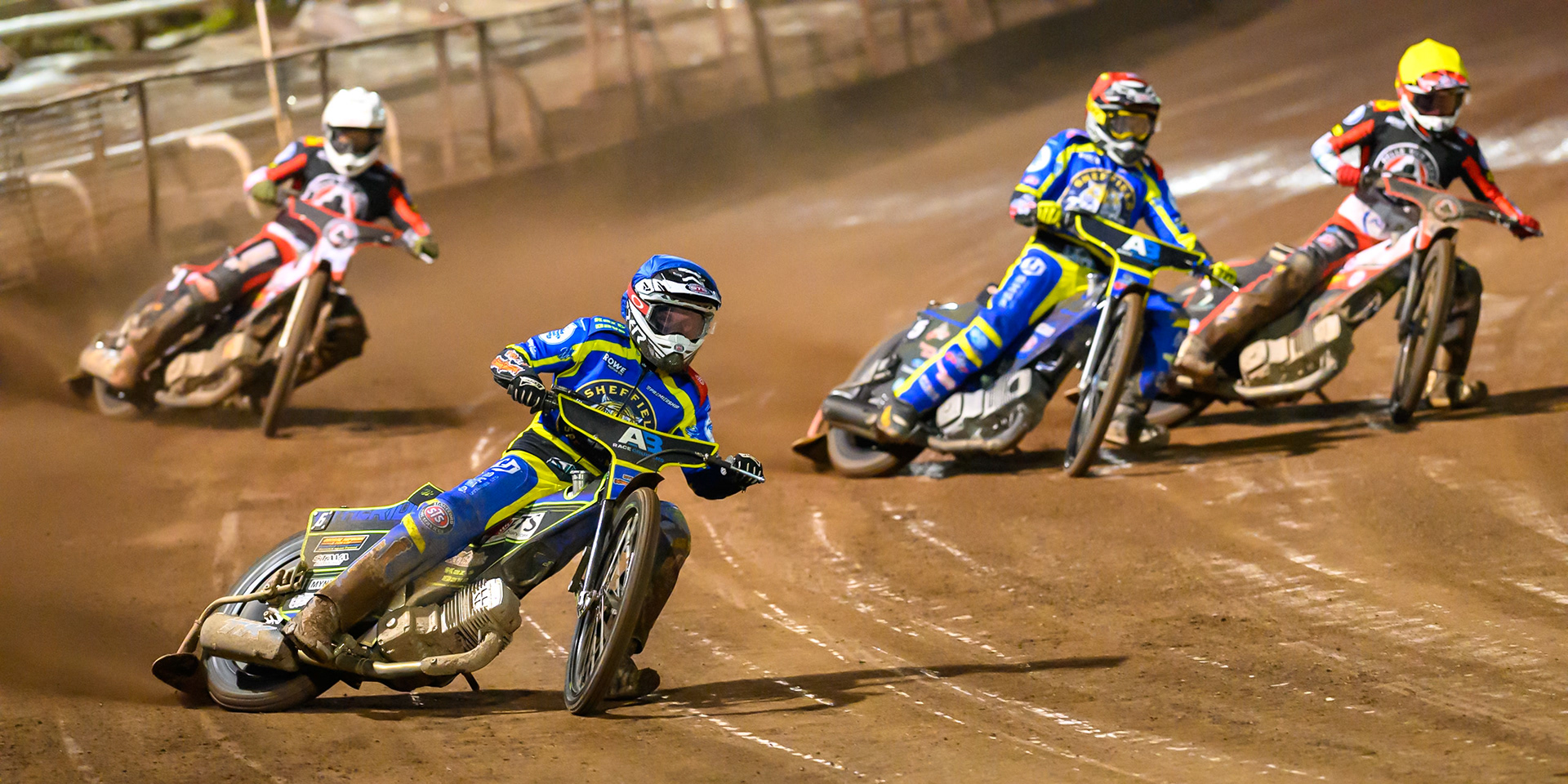 Jye Etheridge of Sheffield Tigers  in Blue leading Josh Pickering of Sheffield Tigers  in Red, Zach Cook of Belle Vue Aces in Yellow and Peter Kildemand of Belle Vue Aces in White during the Knockout Cup Northern Section match between Sheffield Tigers and Belle Vue Aces at Owlerton Stadium, Sheffield on Thursday 2nd April 2026. (Photo: Ian Charles | MI News)