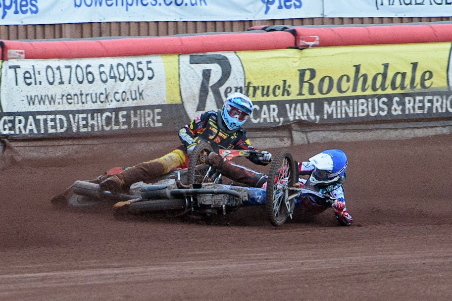 MANCHESTER, UK. JULY 29TH   Harry McGurk (Blue) picks up some drive and falls during the National Development League match between Belle Vue Colts and Leicester Lion Cubs at the National Speedway Stadium, Manchester on Thursday 29th July 2021. (Credit: Ian Charles | MI News)