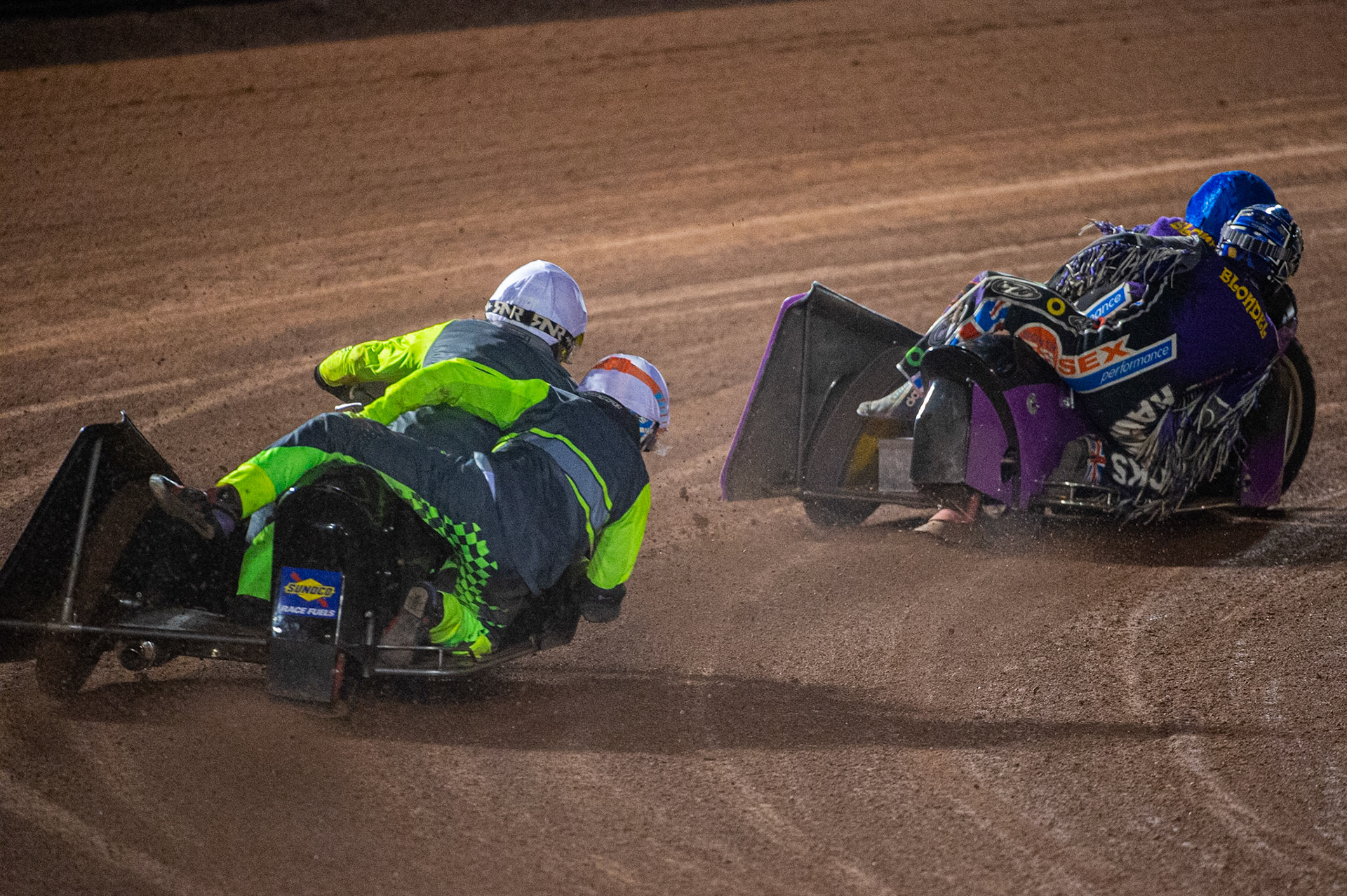 MANCHESTER, ENGLAND Philip Wynn & Adam Cowper Smith(11) (White) chases Clint Blondel & Richard Webb(10) during the  ACU Sidecar Speedway Manchester Masters,  Belle Vue National Speedway Stadium, Manchester Saturday 12 October 2019 (Credit: Ian Charles | MI News)
