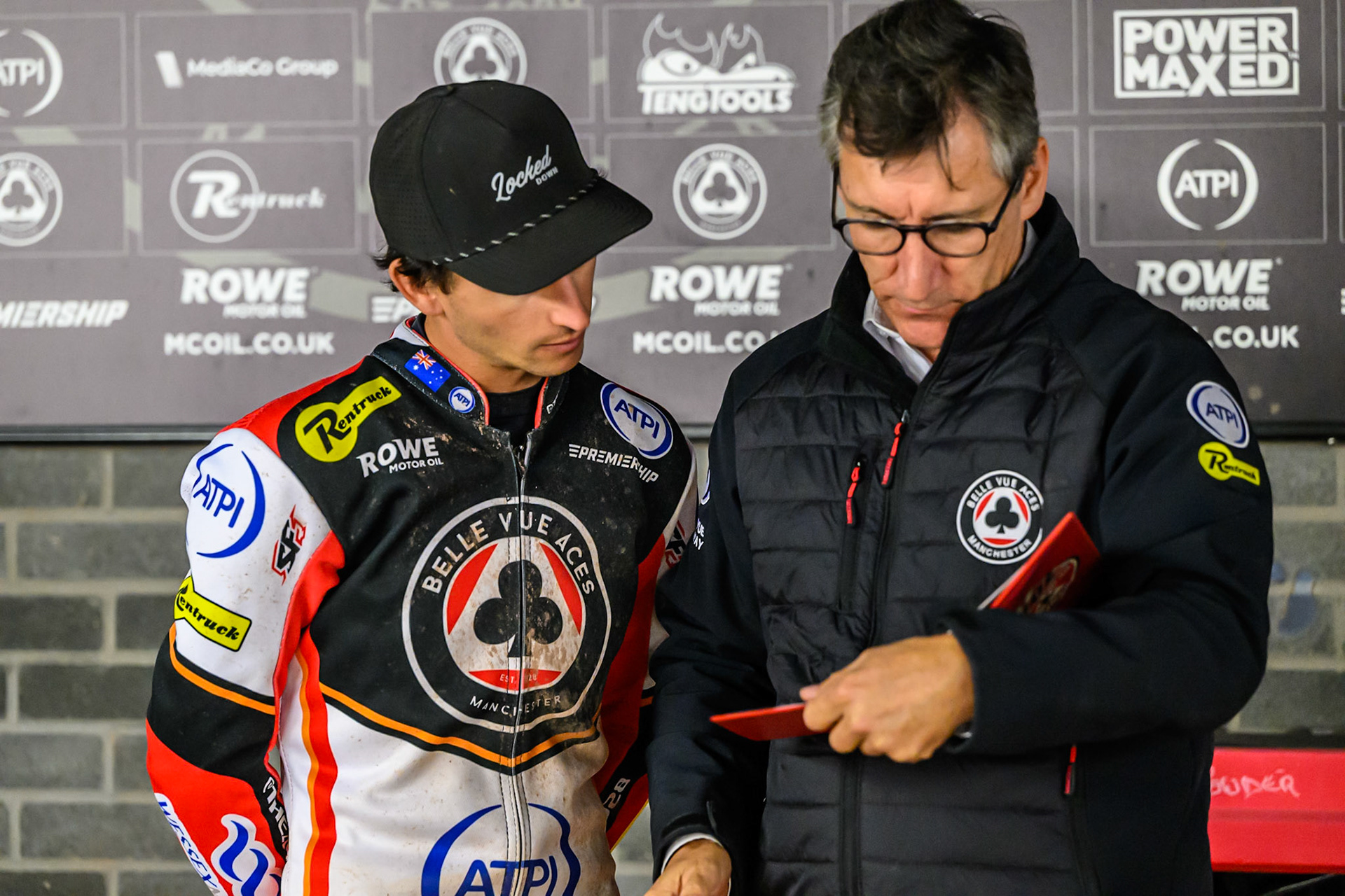 Zach Cook of Belle Vue Aces  (Left) with Mark Lemon, Team Manager of Belle Vue Aces during the Rowe Motor Oil Premiership Play Off Semi Final 1 (1st Leg)  between Belle Vue Aces and Ipswich Witches at the National Speedway Stadium, Manchester on Monday 8th September 2025. (Photo: Ian Charles | MI News)