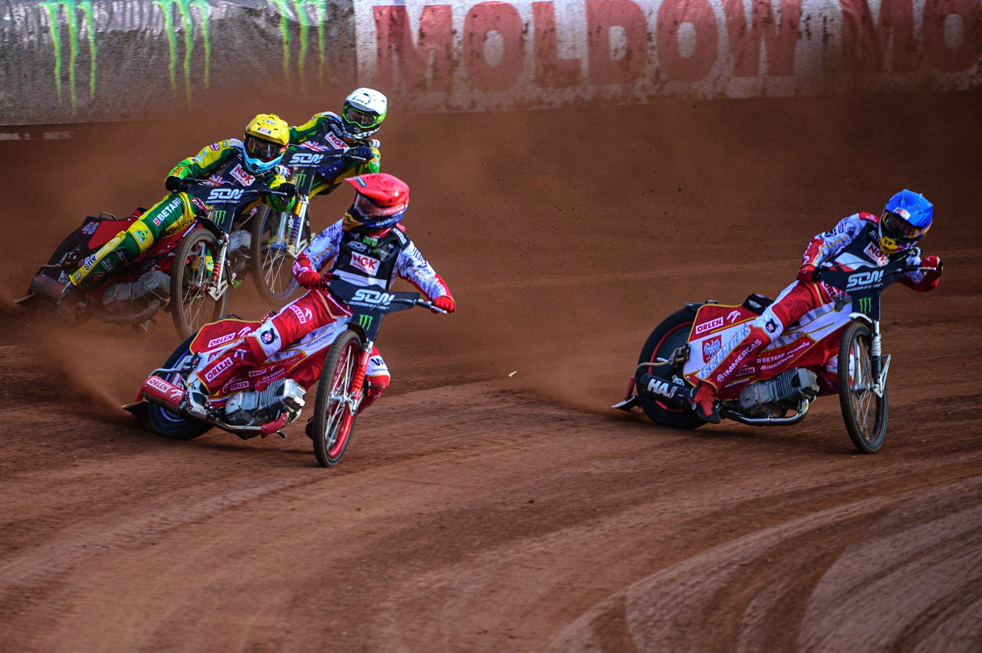 MANCHESTER, UK. OCT 16TH Bartosz Zmarzlik (Red) and Maciej Janowski of Poland (Blue) lead  Max Fricke (Yellow) and Jason Doyle of Australia (White) during the Monster Energy FIM Speedway of Nations at the National Speedway Stadium, Manchester on Saturday  16th October 2021. (Credit: Ian Charles | MI News)