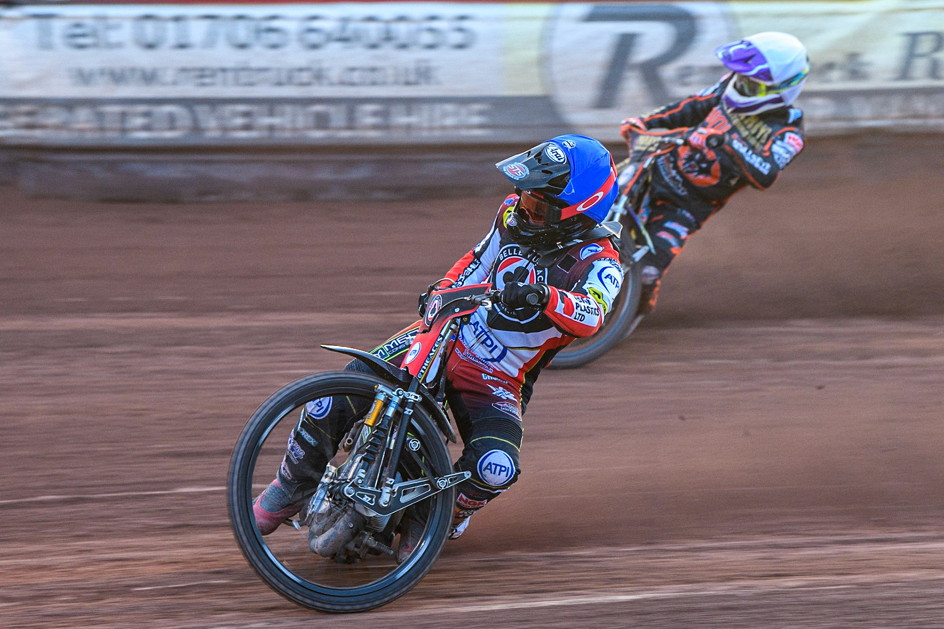 Tom Brennan (Blue) leads Rory Schlein (White) during the Sports Insure Premiership match between Belle Vue Aces and Wolverhampton Wolves at the National Speedway Stadium, Manchester on Monday 3rd July 2023. (Photo: Ian Charles | MI News)